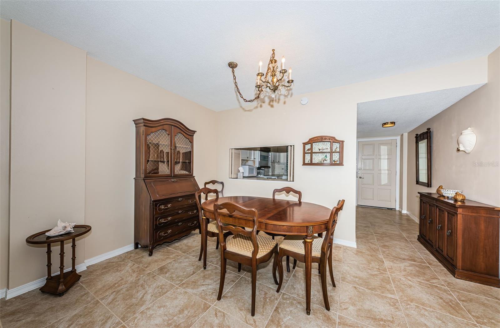 Another view of dining room with pass-through to kitchen