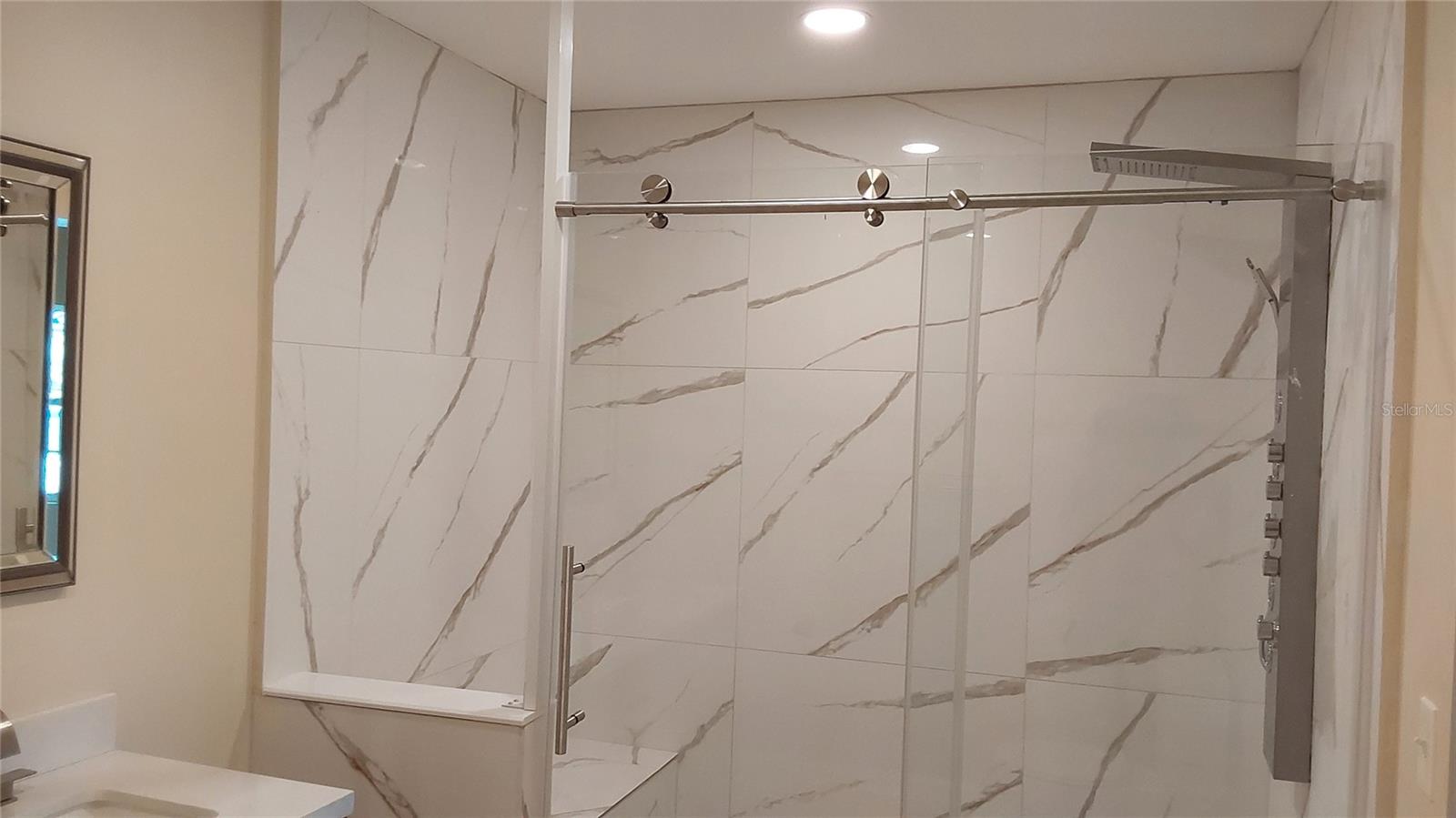 Master bath shower with built in bench