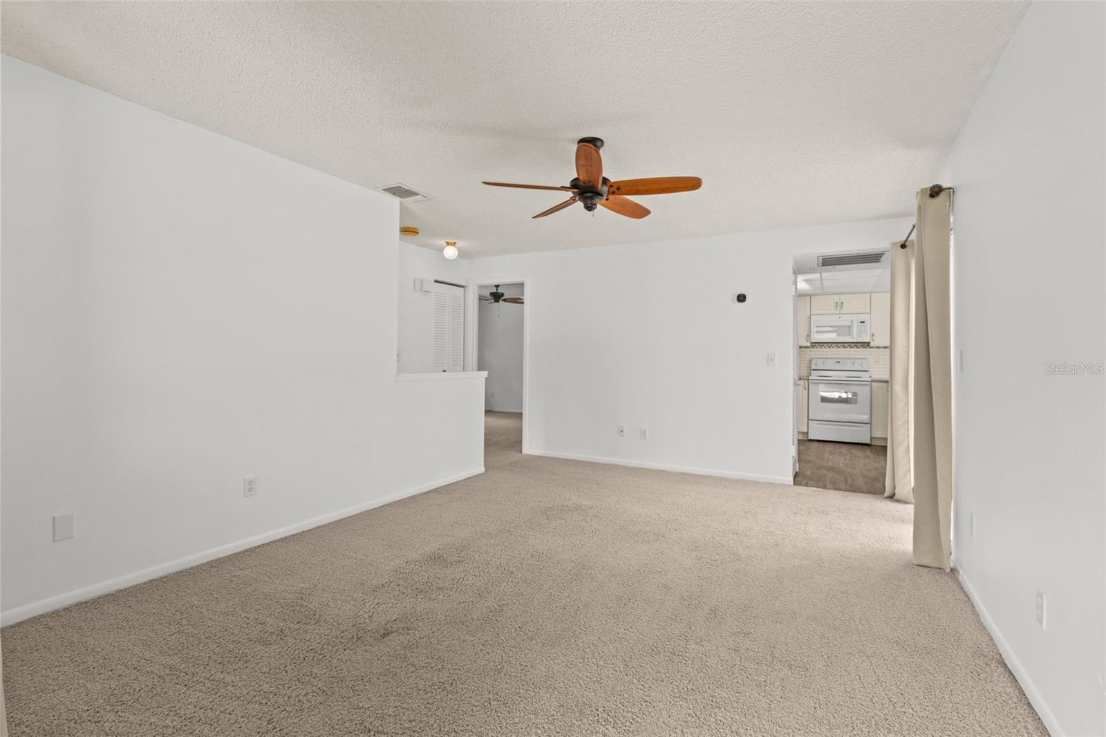 View of living and kitche n from front door