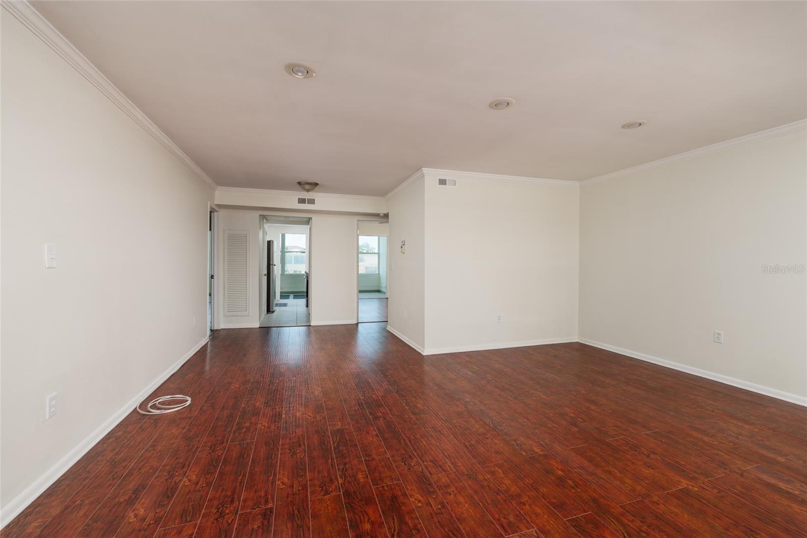 Living & Dining areas: High end laminate flooring & crown molding.