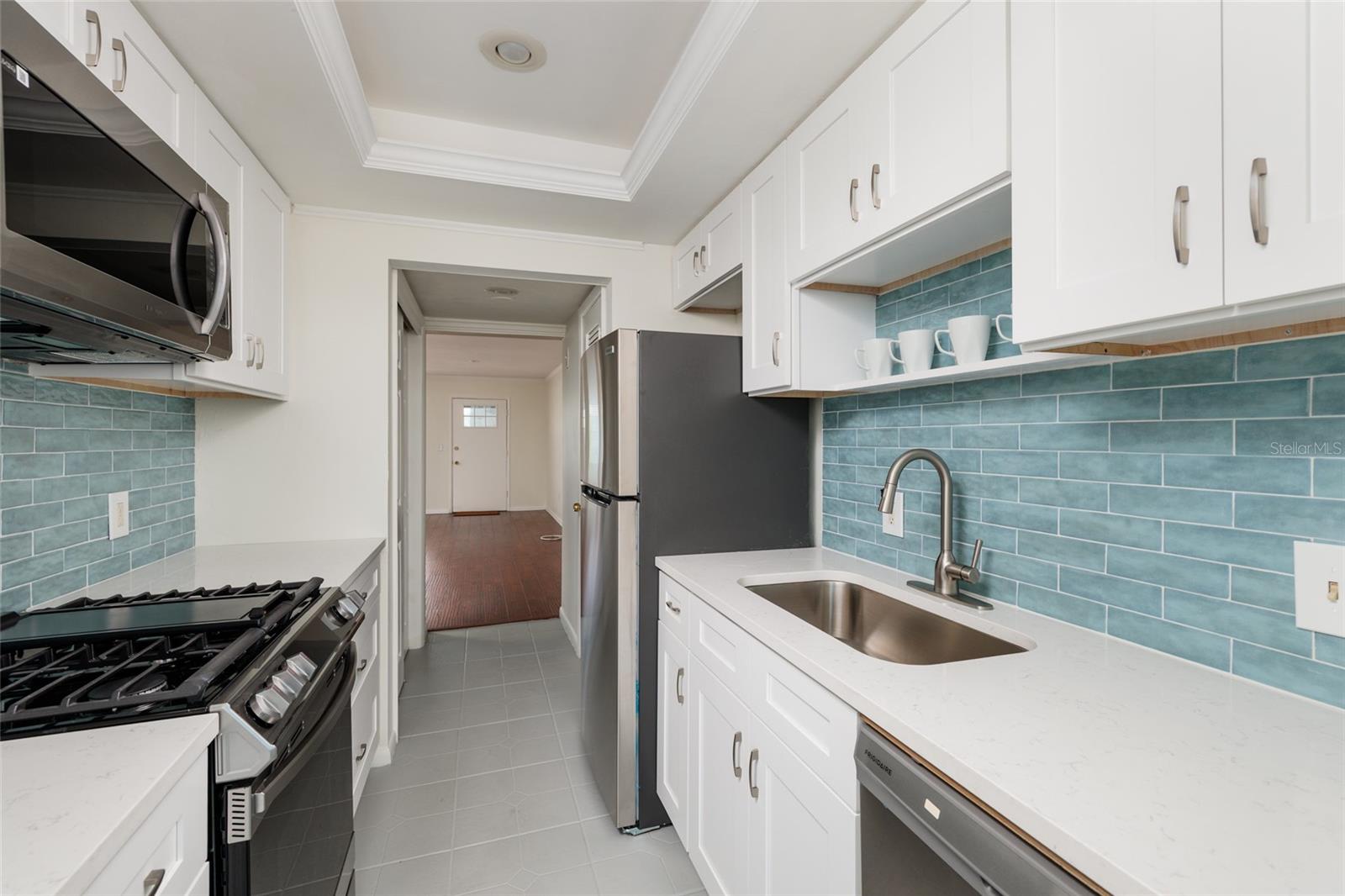 New appliances. Quartz counters. Closet pantry & extra storage closet. Tray ceiling.