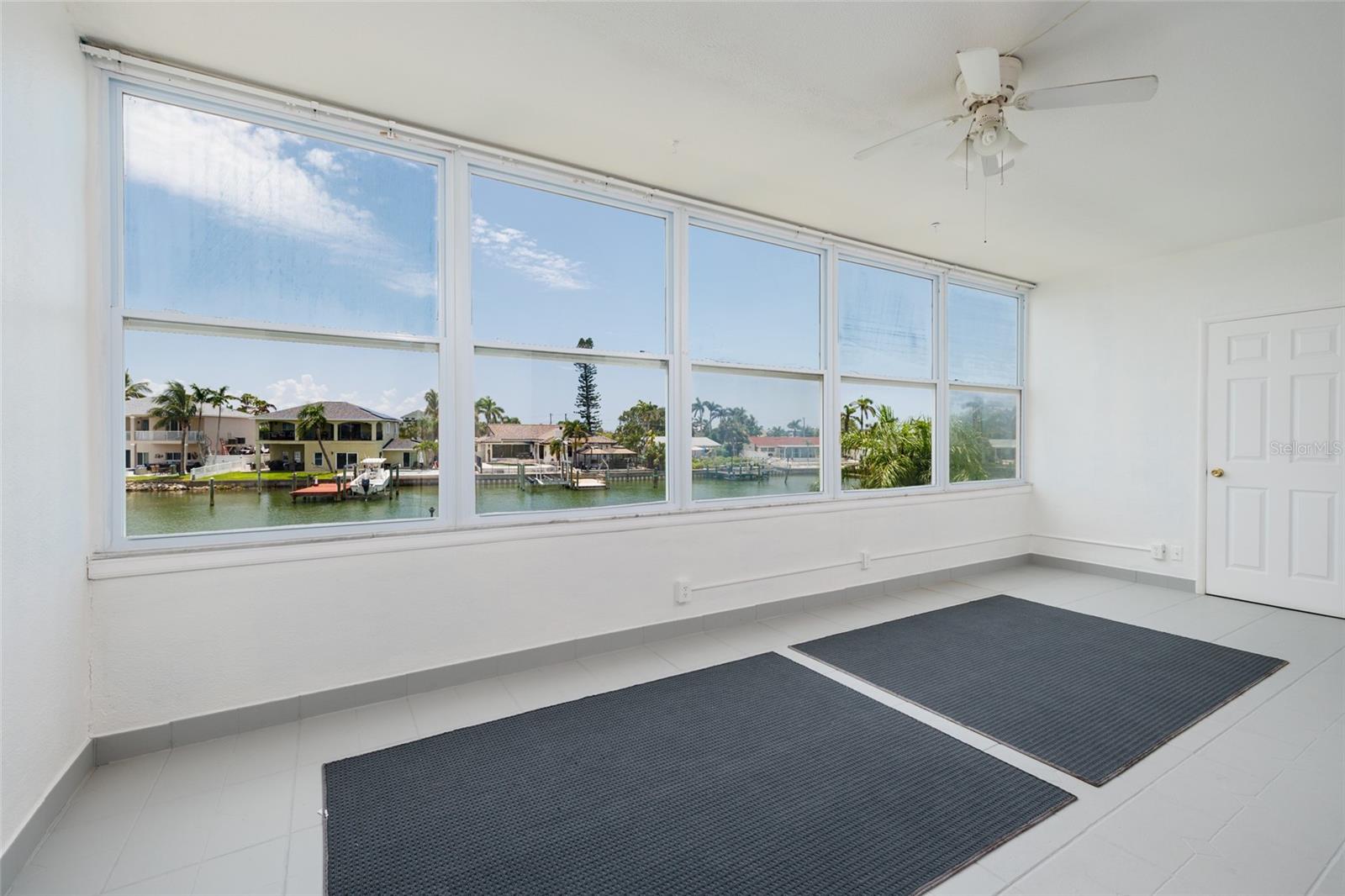 Florida Room w/Storage closet. 21' x 9'. Faces SE.