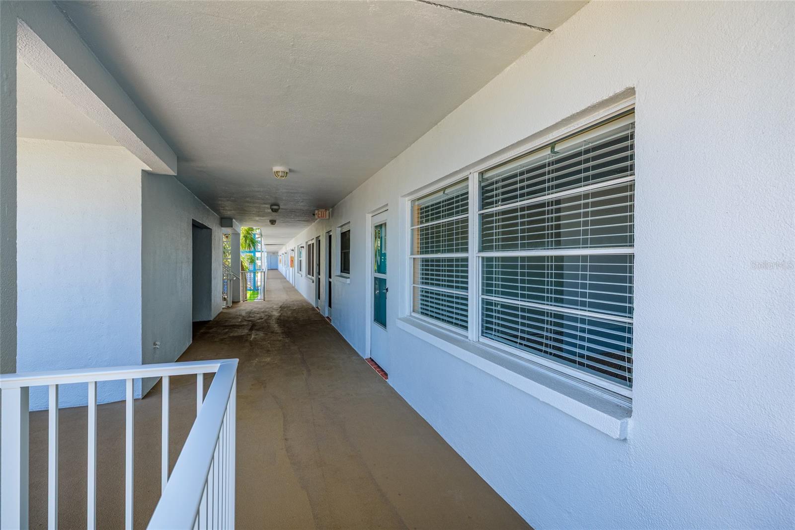 #209 & covered walkway on 2nd floor.