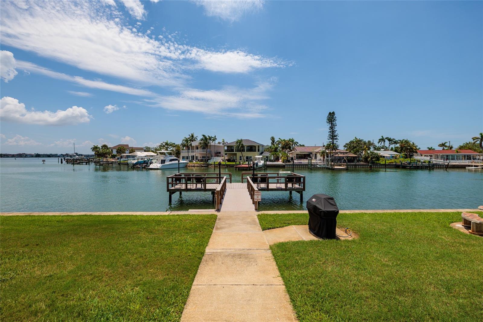 Pier w/grill on the back lawn of Shore Plaza. A short distance from the unit.