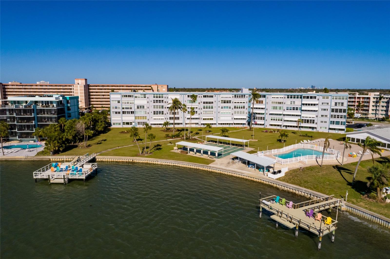 Shore community pool/clubhouse, waterfront grilling area & shuffleboard courts.