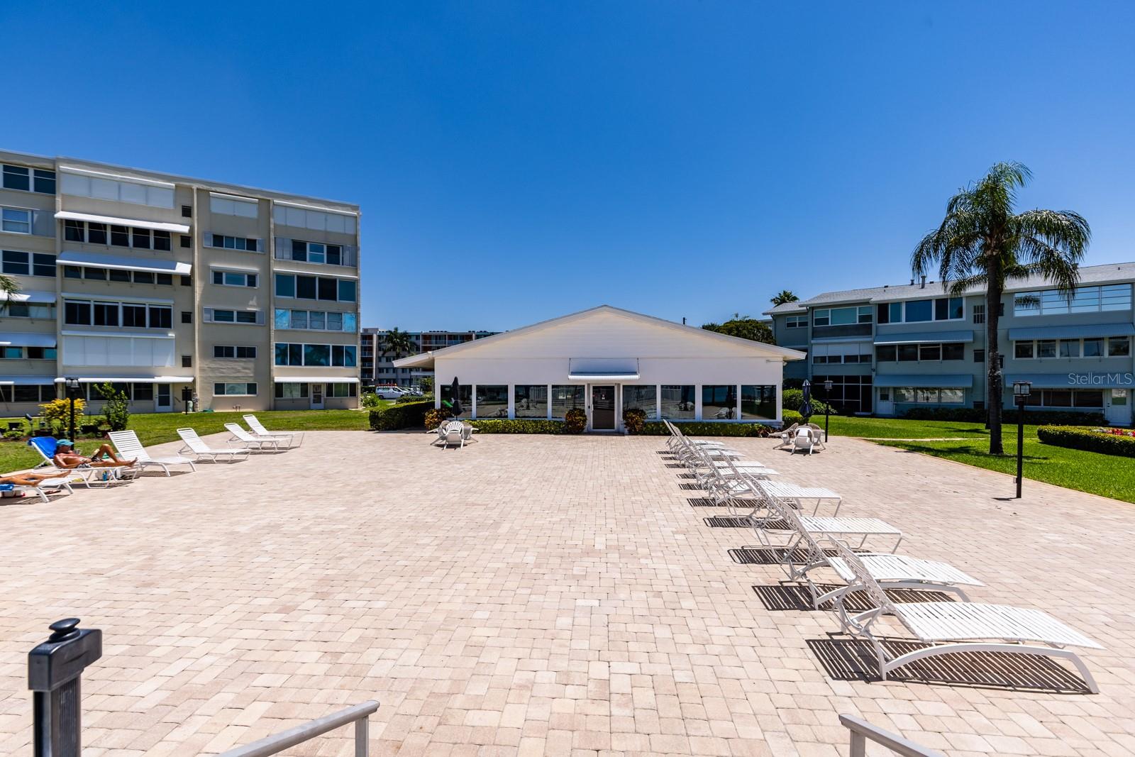 Clubhouse pool/sun deck & clubhouse w/Fitness center, billiards & large meeting space w/TV area.
