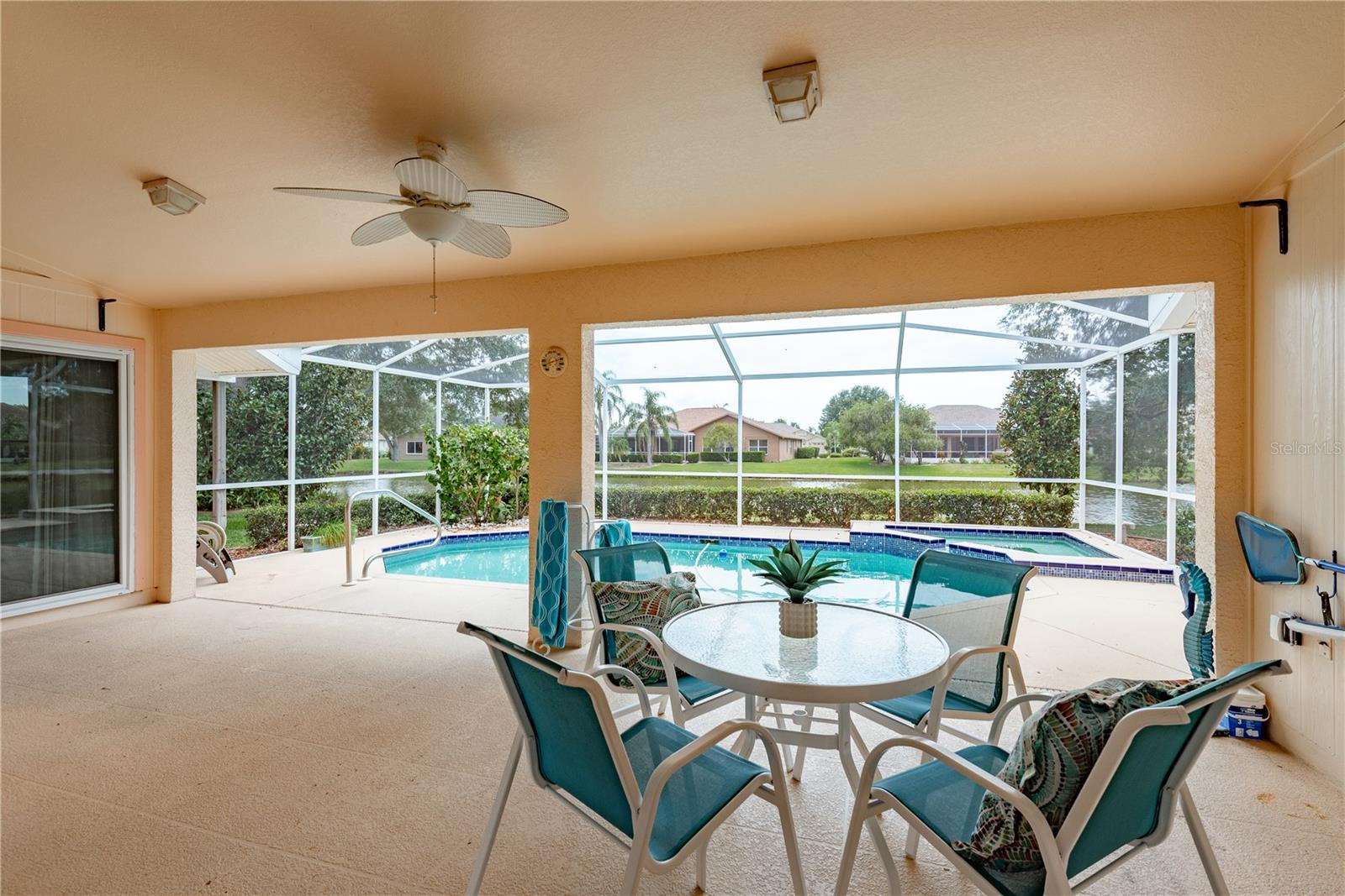 Covered lanai space overlooking pool / pond