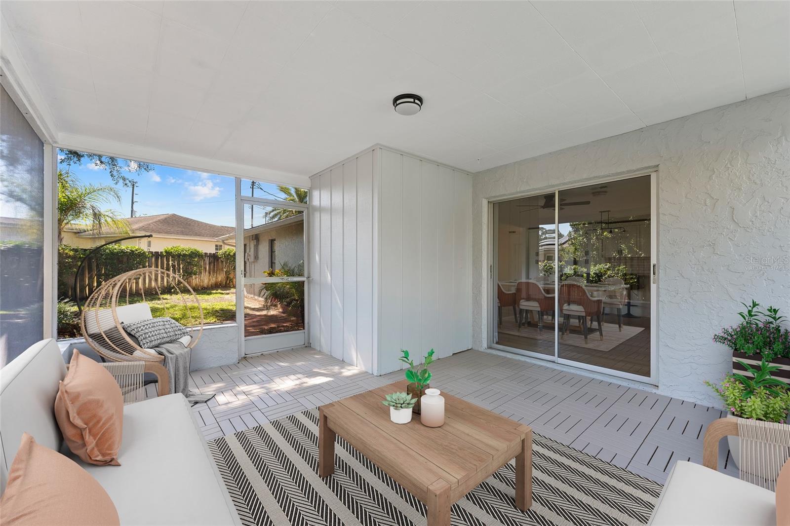 virtually staged back enclosed patio