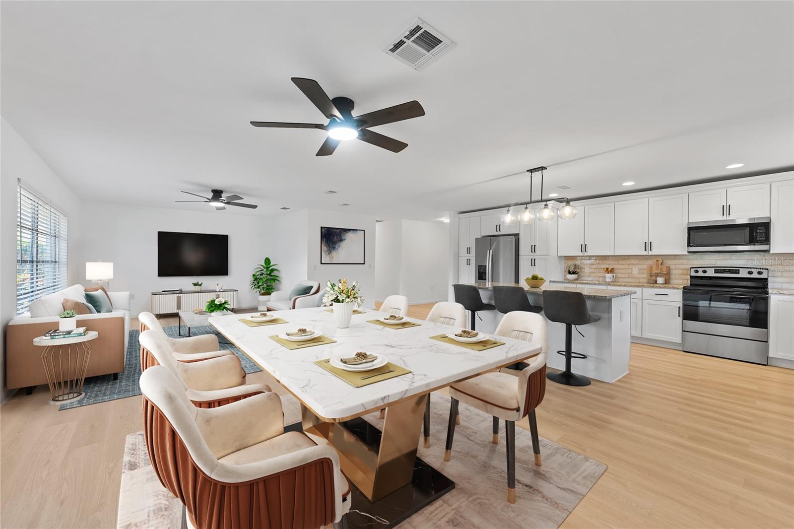virtually staged kitchen, dining, living room