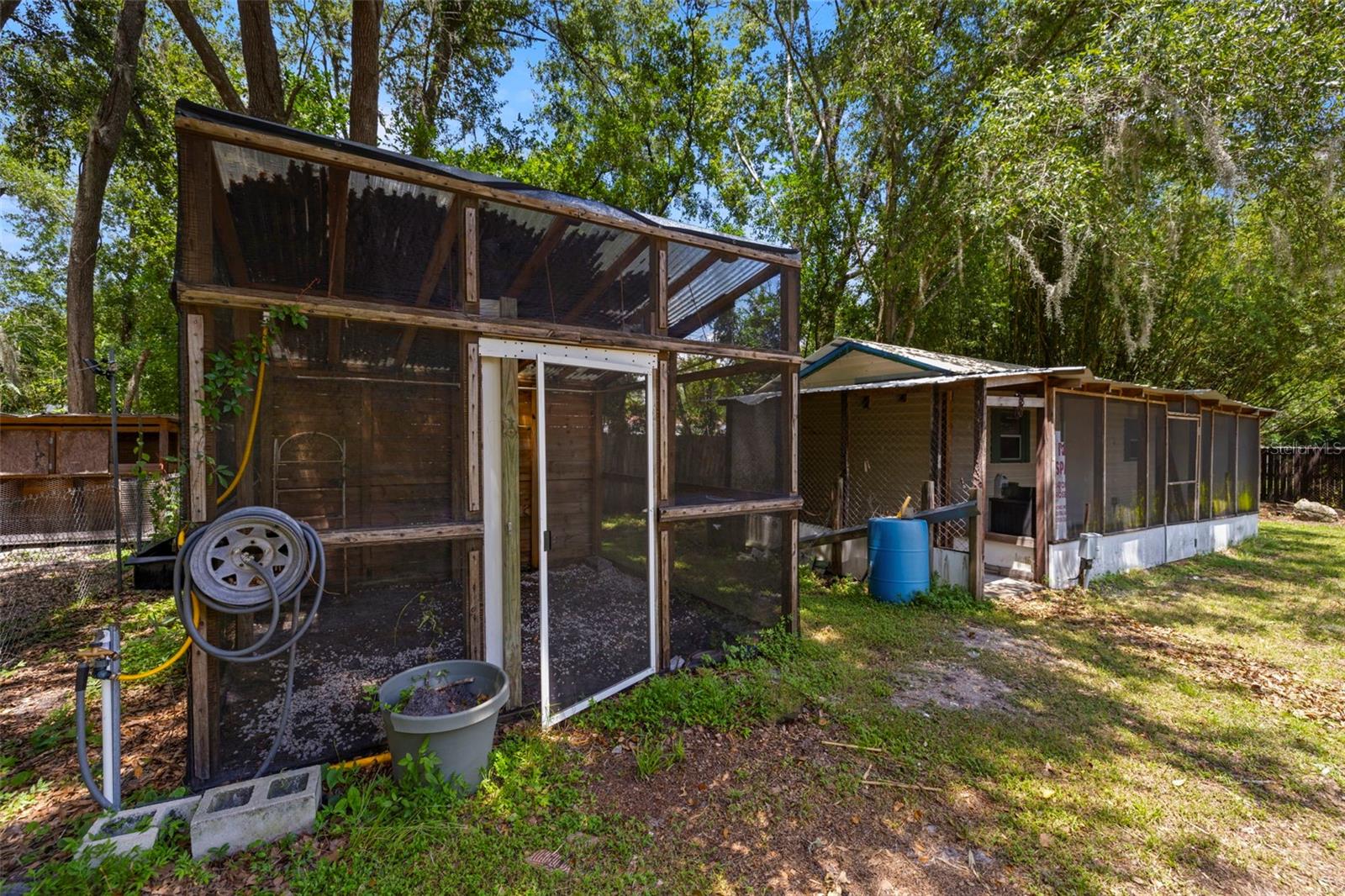 Green House with overhead sprinkler system & light