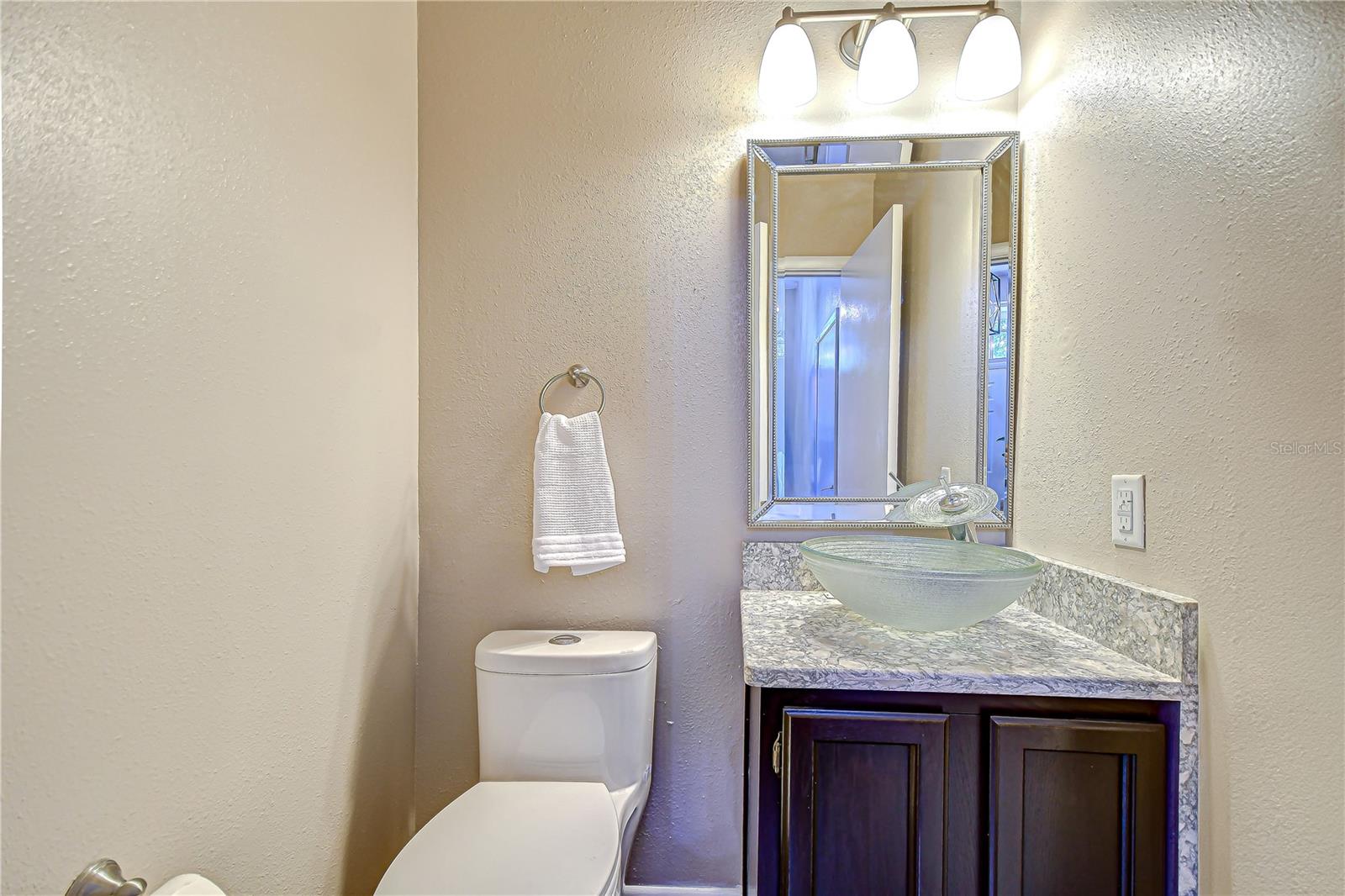 Half bath with higher low flow toilet