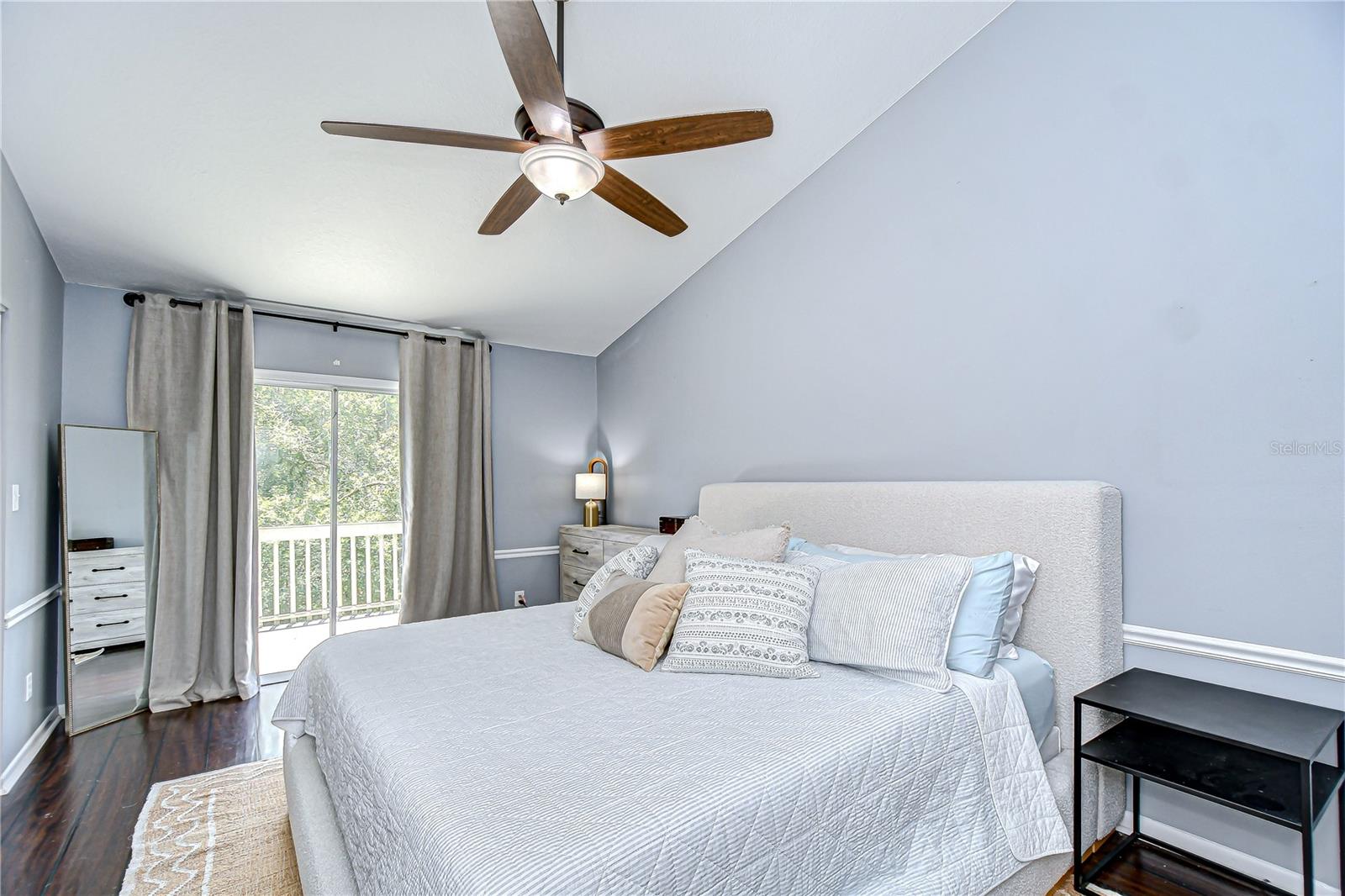 Primary bedroom with slider to deck