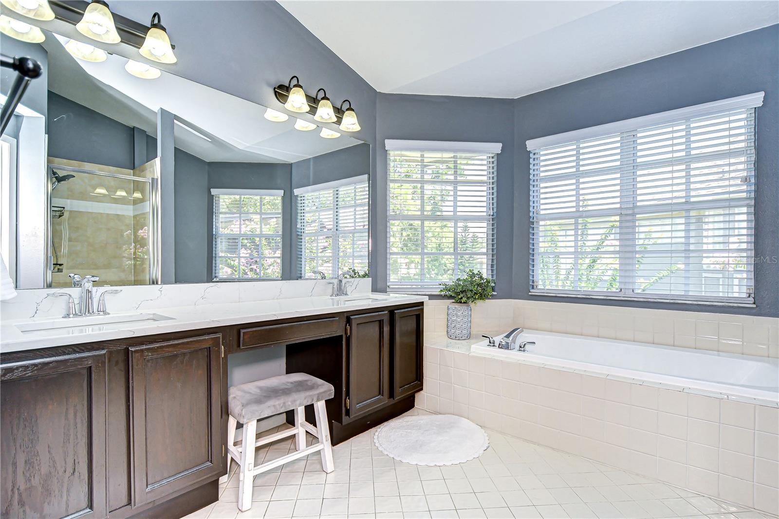 Primary private bath with makeup vanity area