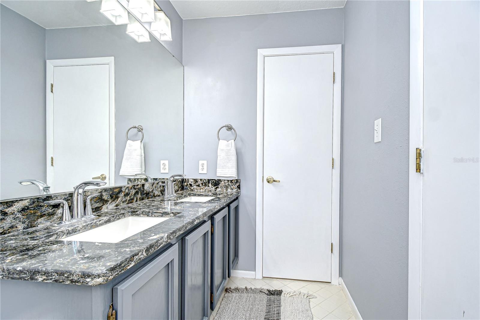 Second bath also accessible from hall