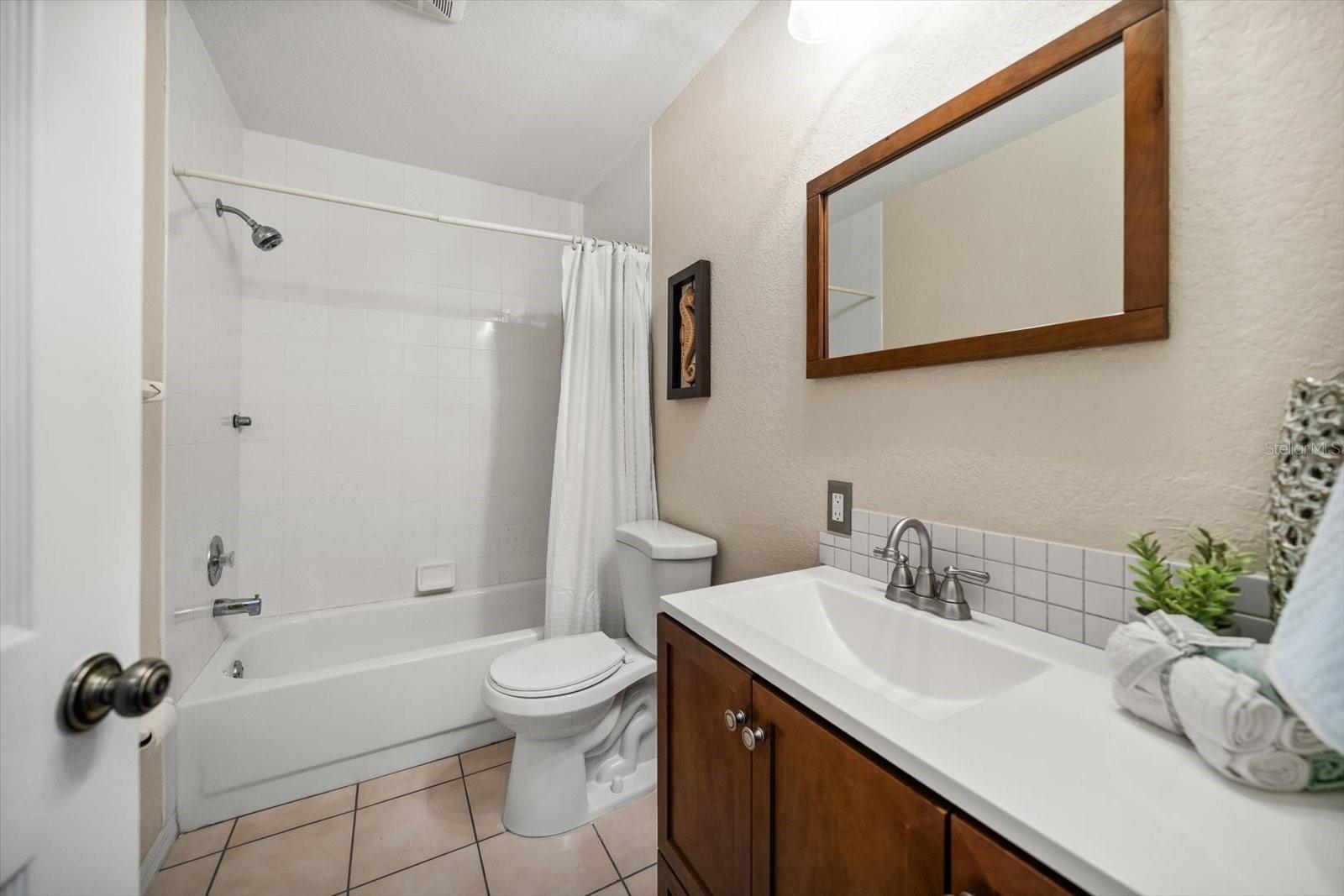 Primary bedroom with ensuite bath.