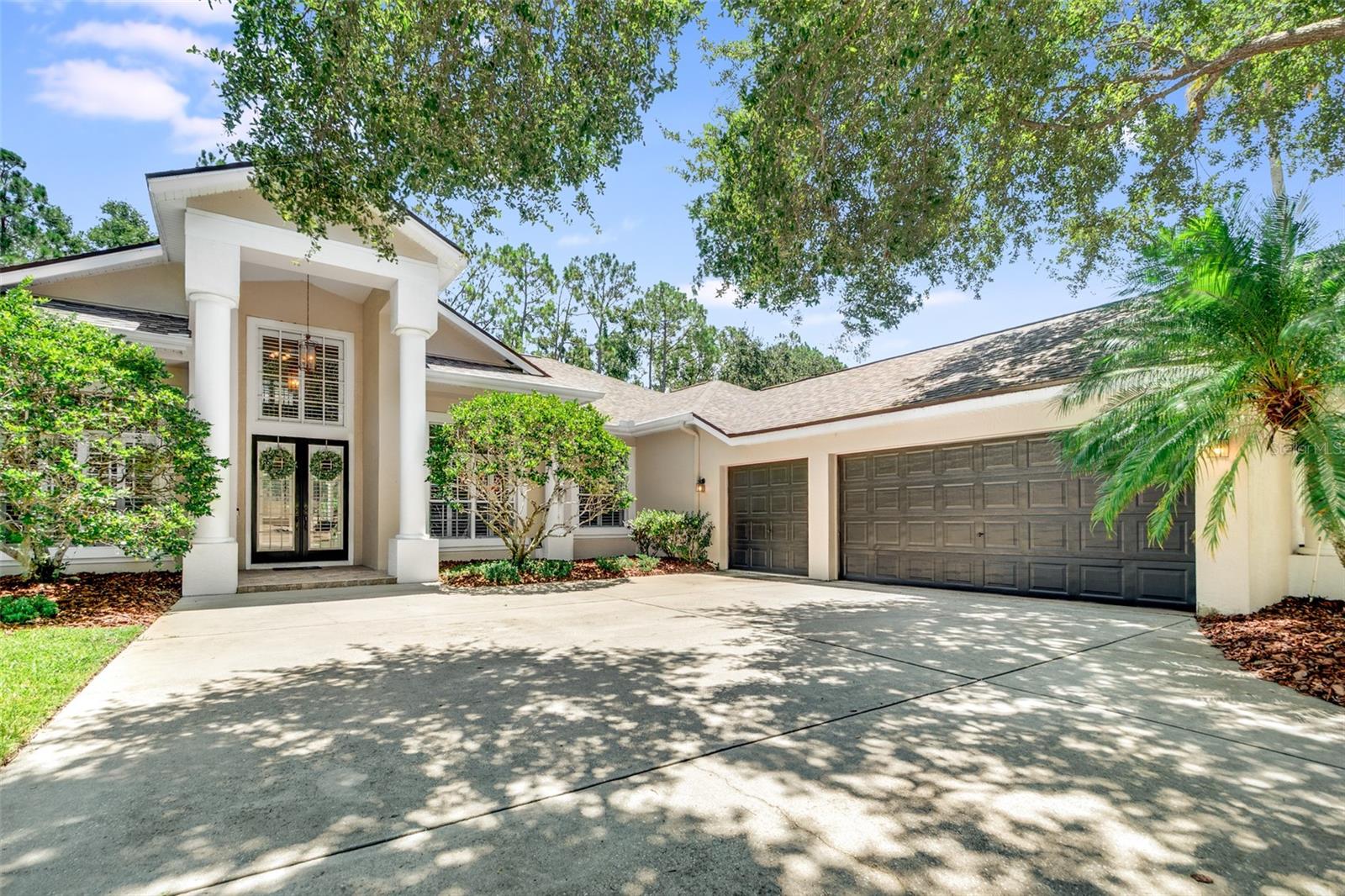 FRONT WITH 3 CAR GARAGE
