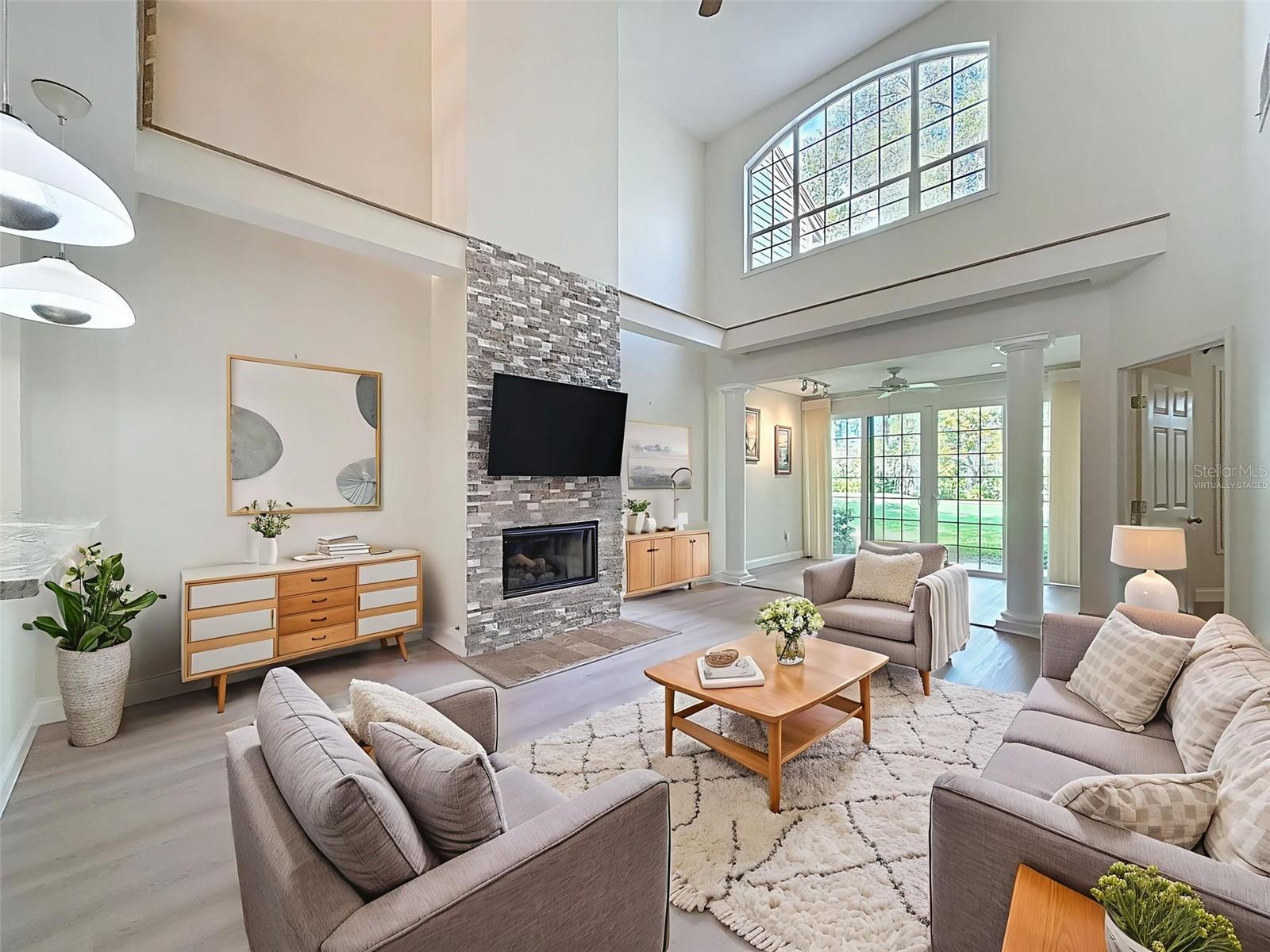Virtually staged- living room with wood burning fireplace