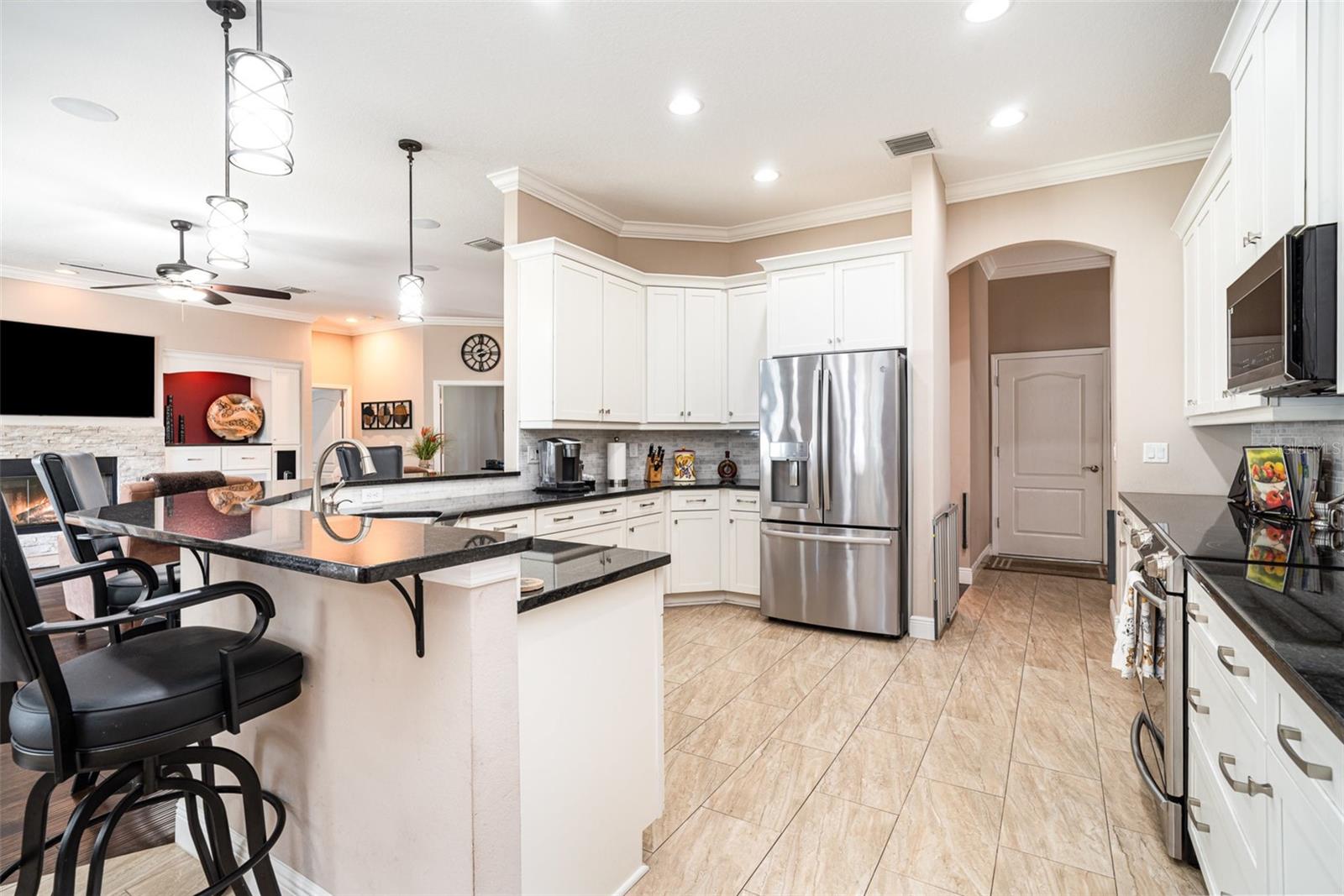36" upper cabinets and black granite coutertops