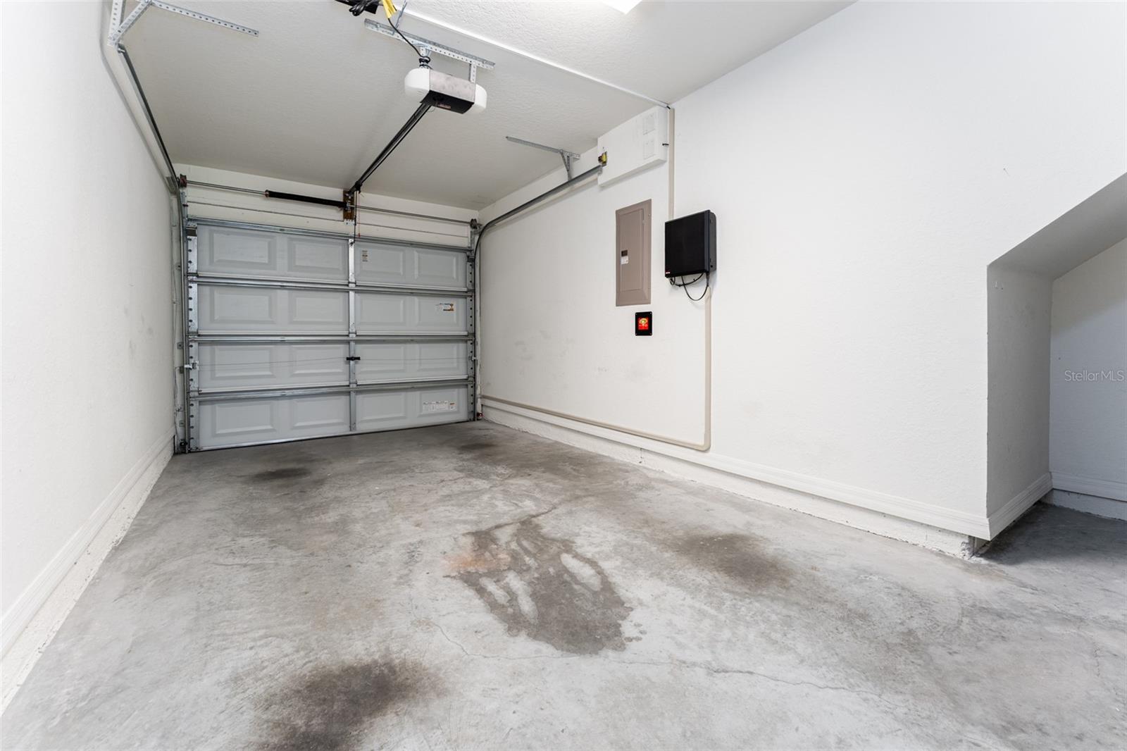 Single Car Garage with small storage area.