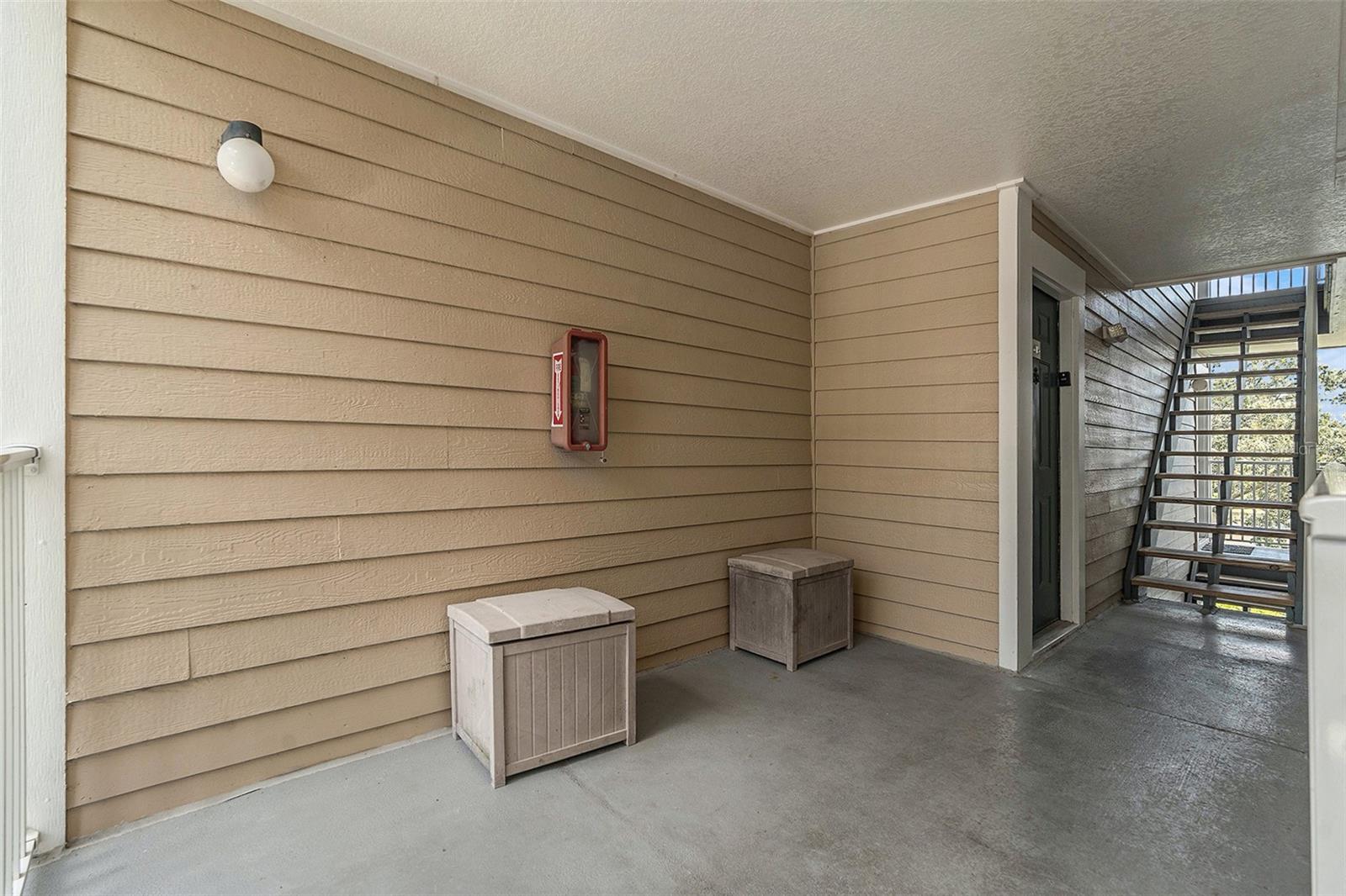 Outside landing with storage bin