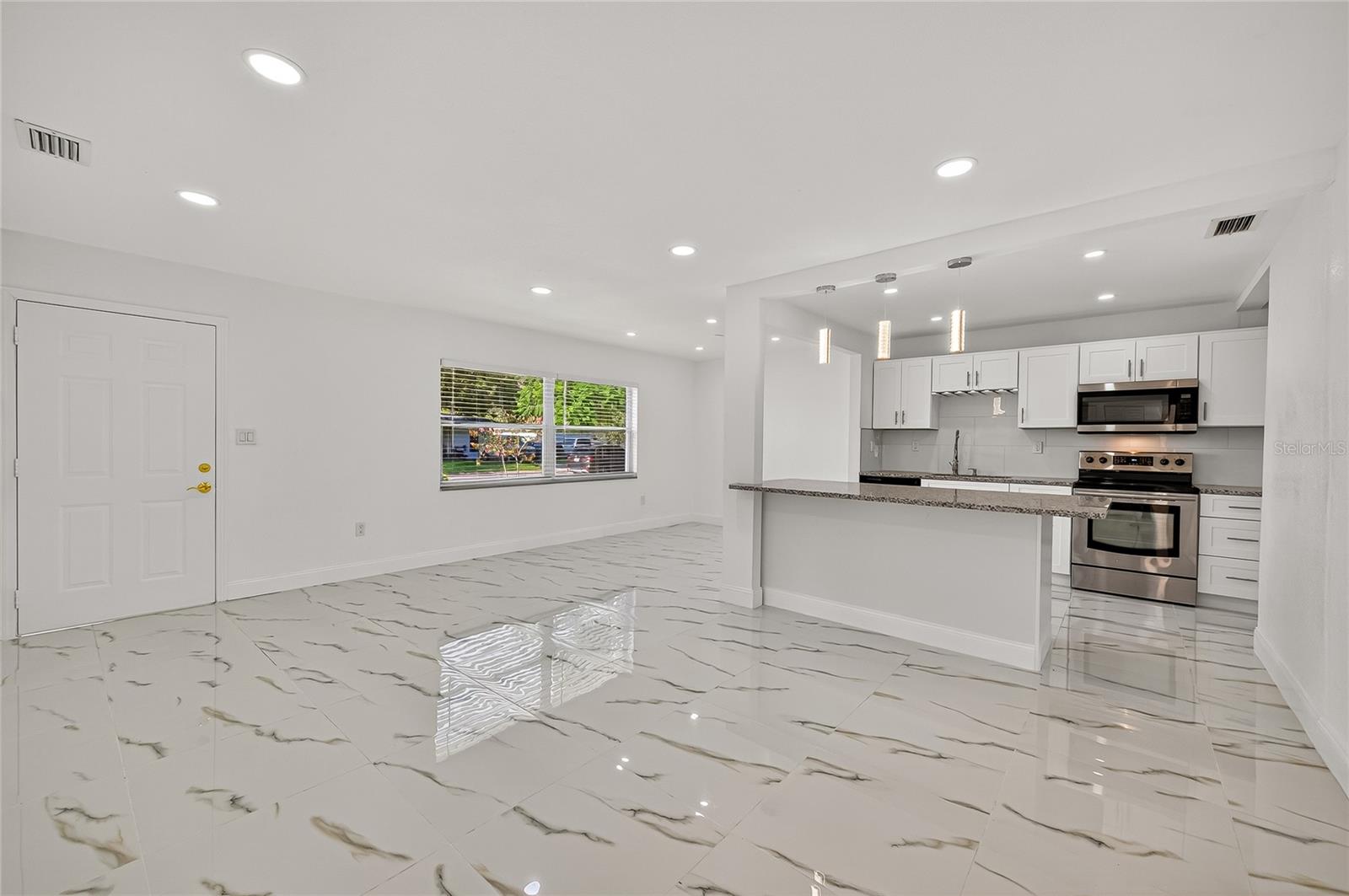 View of living room, Dining and kitchen