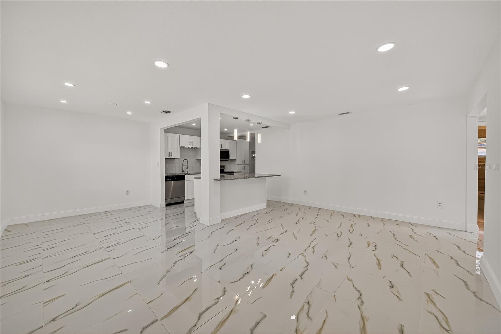 View of living room, Dining and kitchen