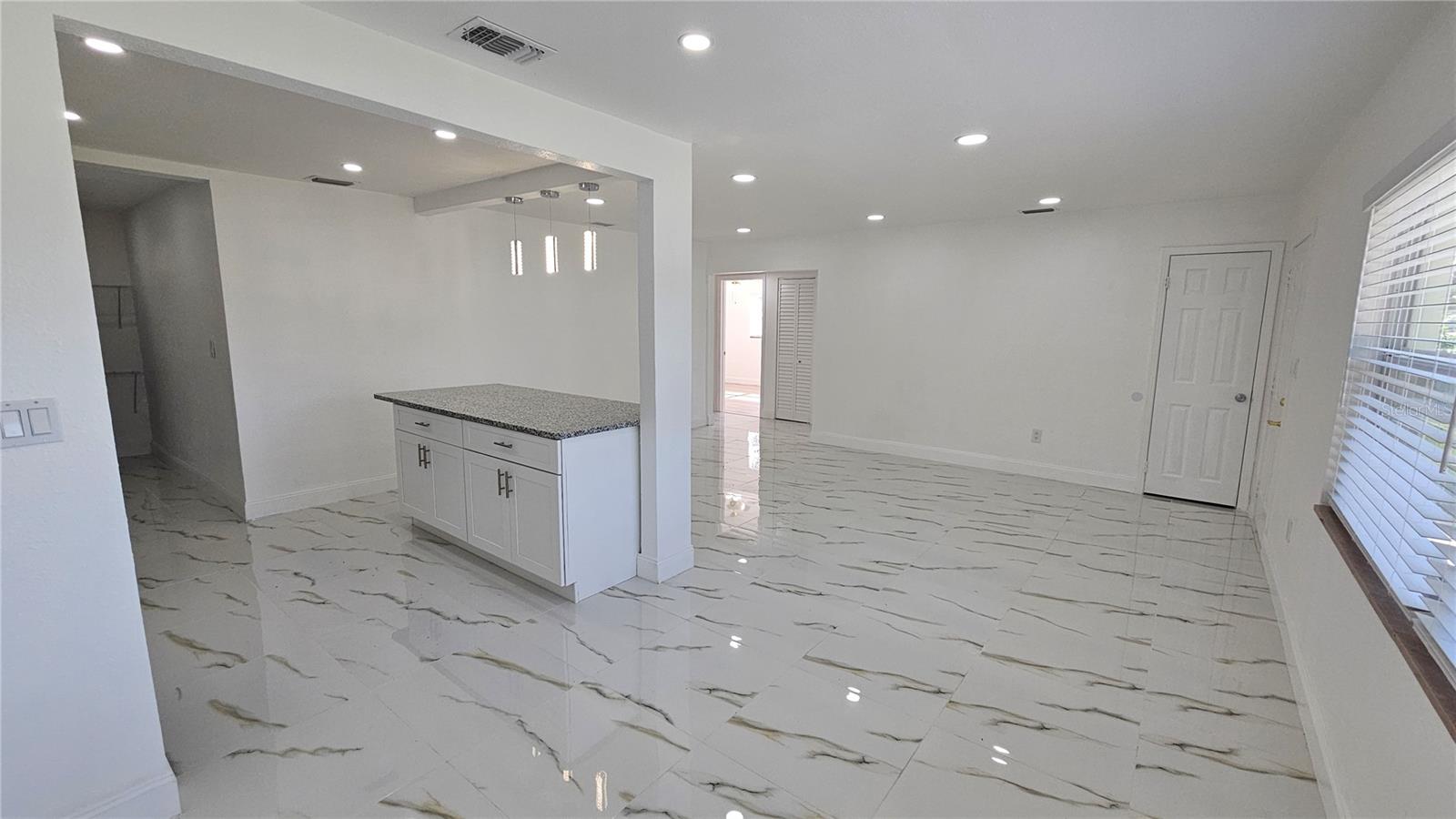 View of living room, Dining and kitchen
