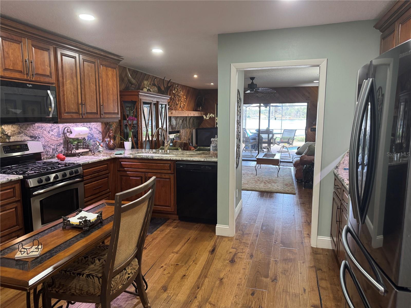 Kitchen view to covered patio & lanai