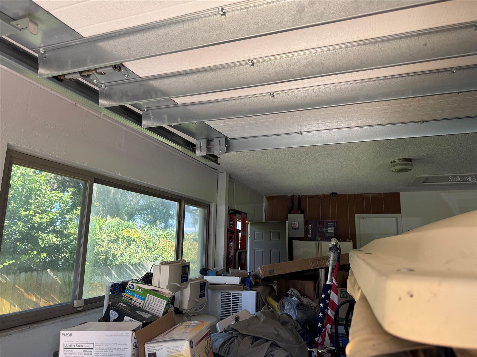Garage has windows with lake view & side garage door.