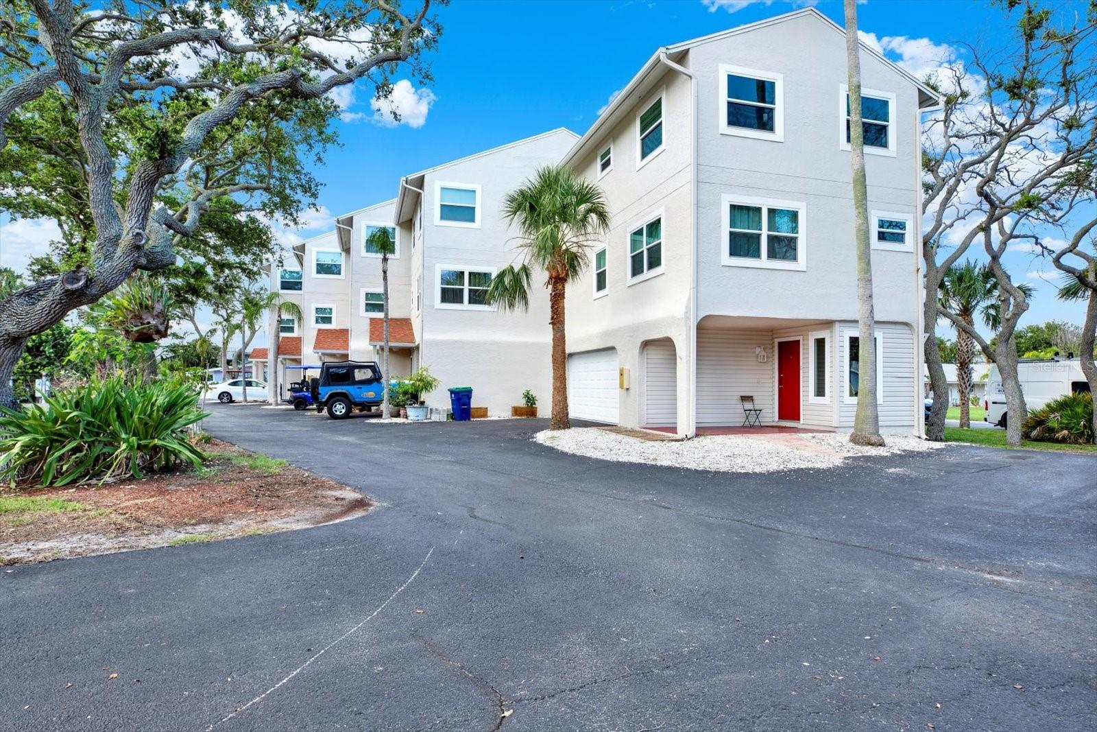 UNIT #1 WITH 2 CAR GARAGE 2 BEDROOMS 2 1/2 BATH AND A DEN