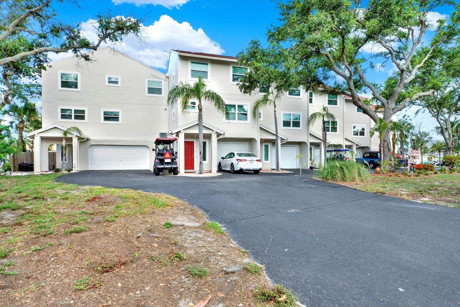 UNIT 5 AND 6  EACH WITH 2 BEDROOMS 2 1/2 BATH AND A DEN WITH SINGLE CAR GARAGE FOR UNIT 5 AND A 2 CAR GARAGE FOR UNIT 6