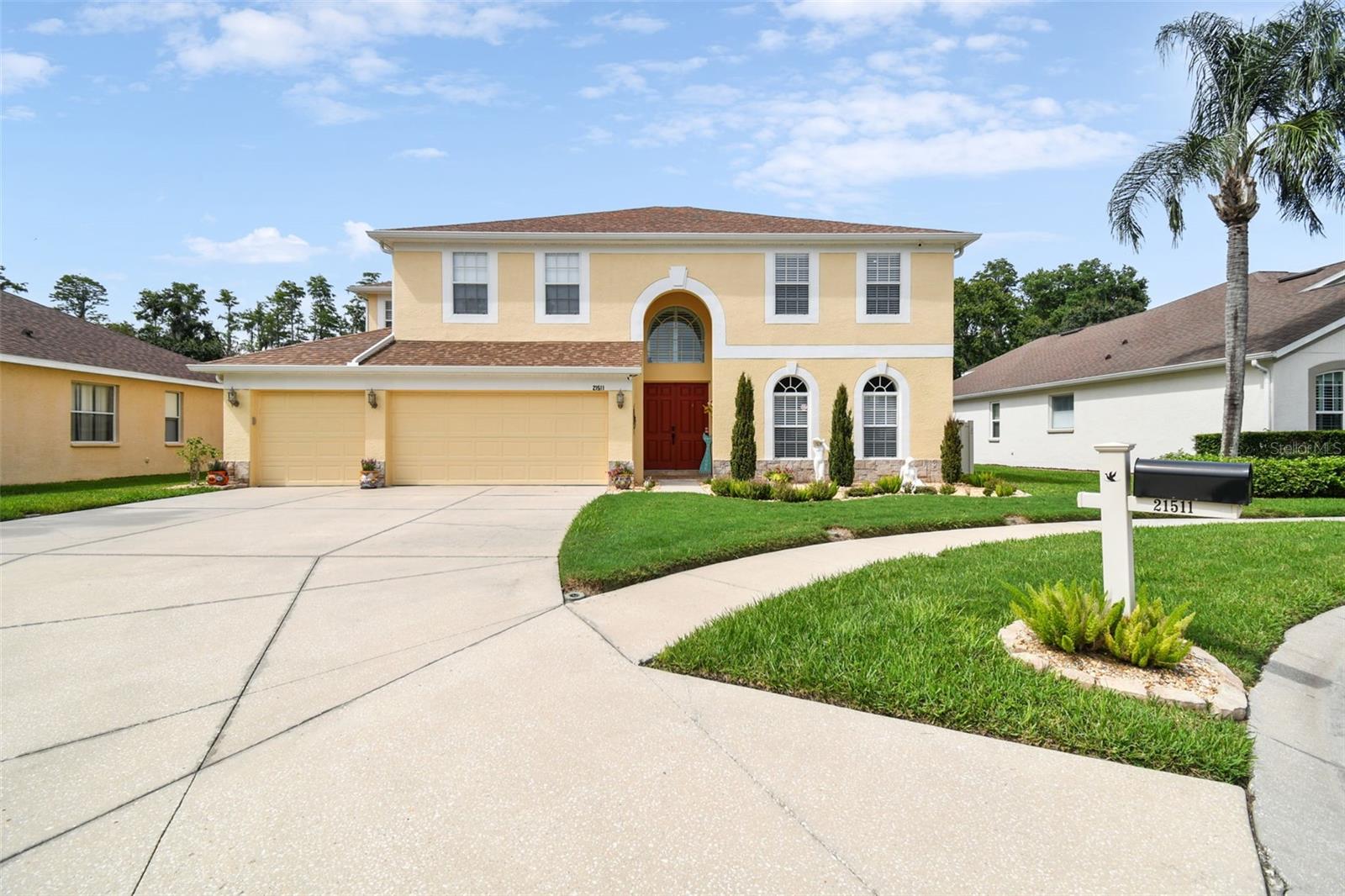3 Car garage with an oversized driveway