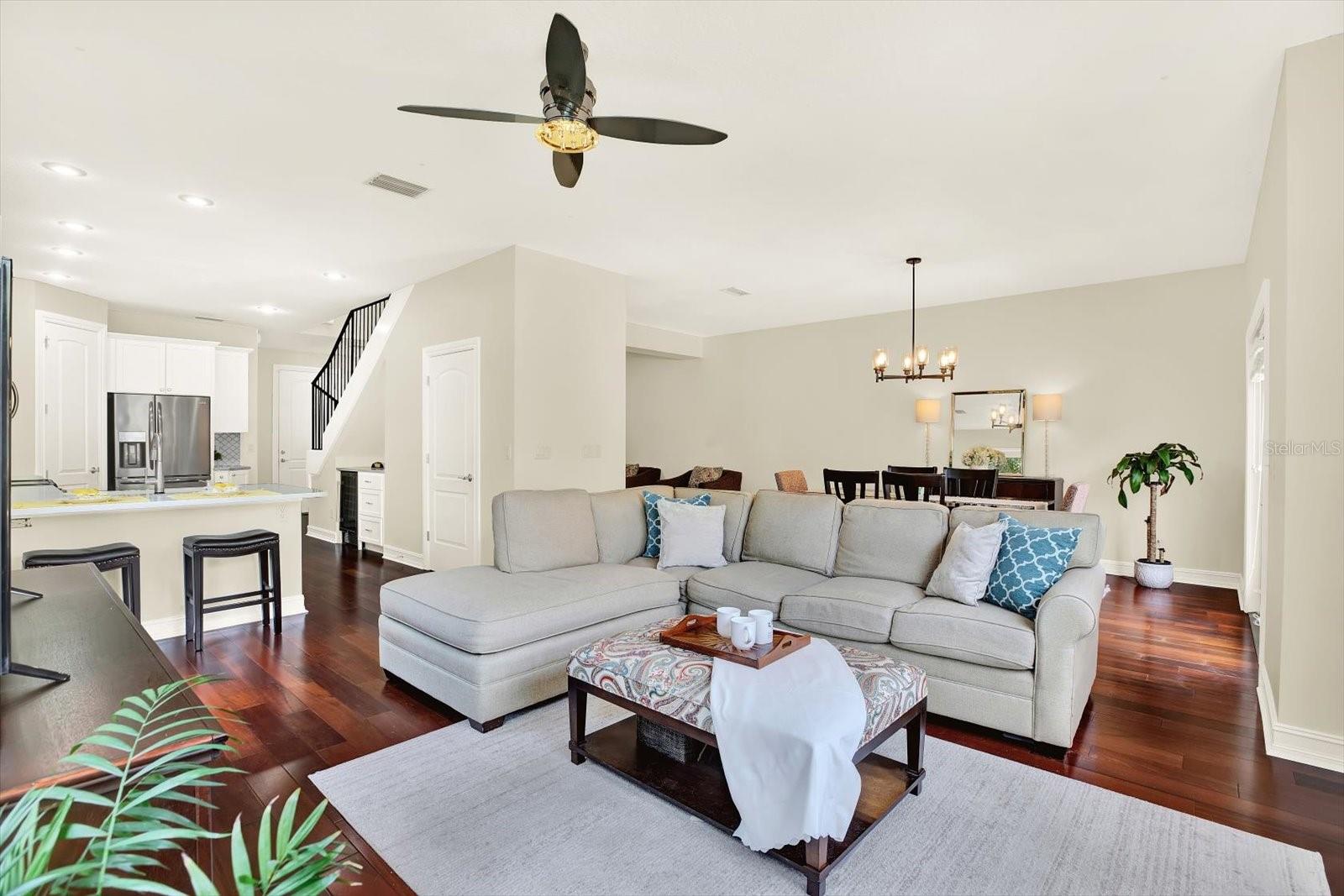 Open concept living room/dining/kitchen