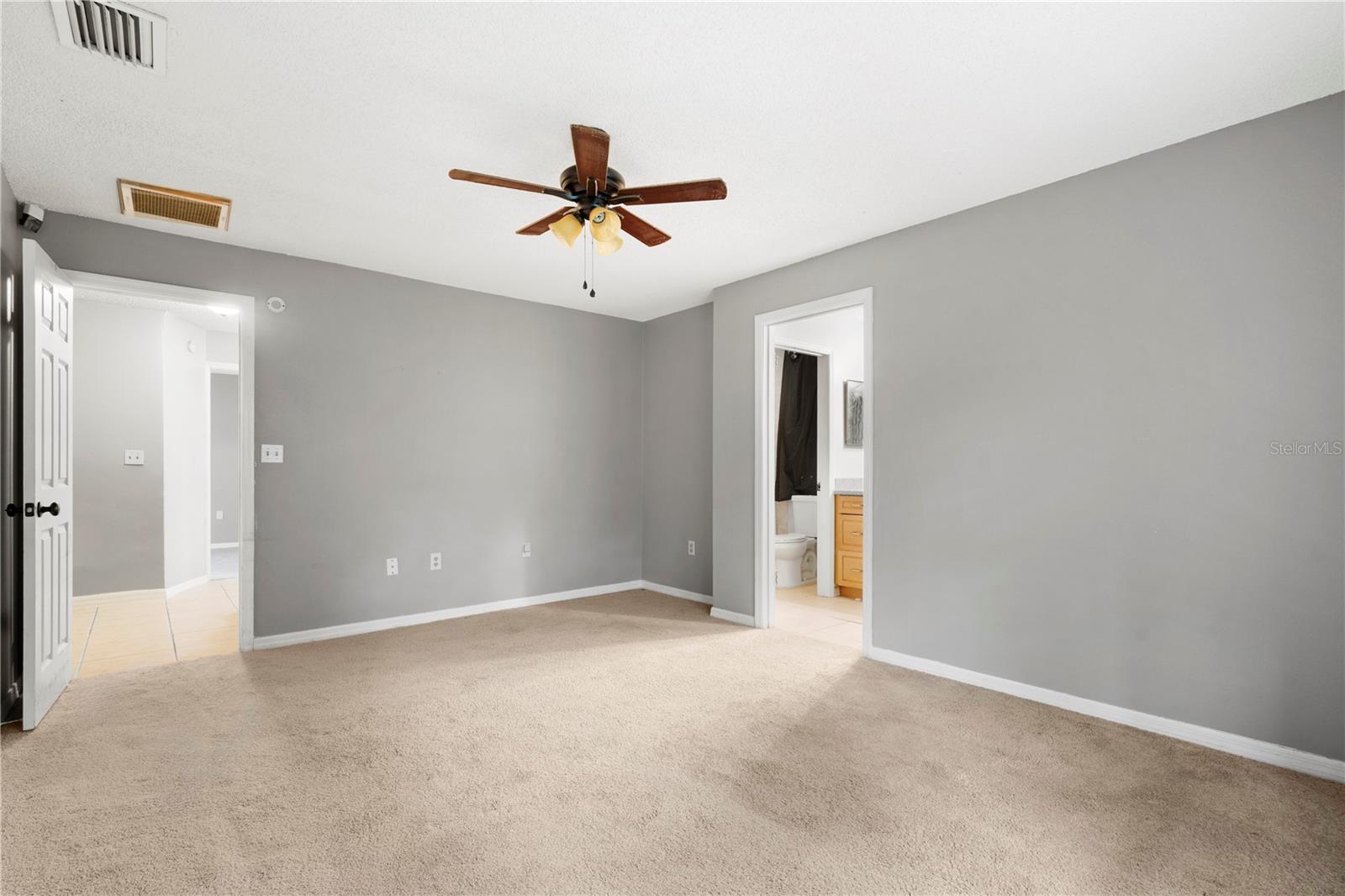 Primary bedroom with ensuite bathroom