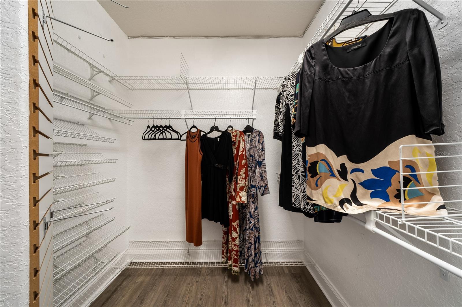 her side of walk-in closet