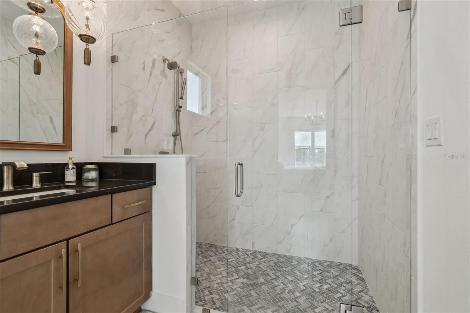 Frameless Shower with upgraded designer tile