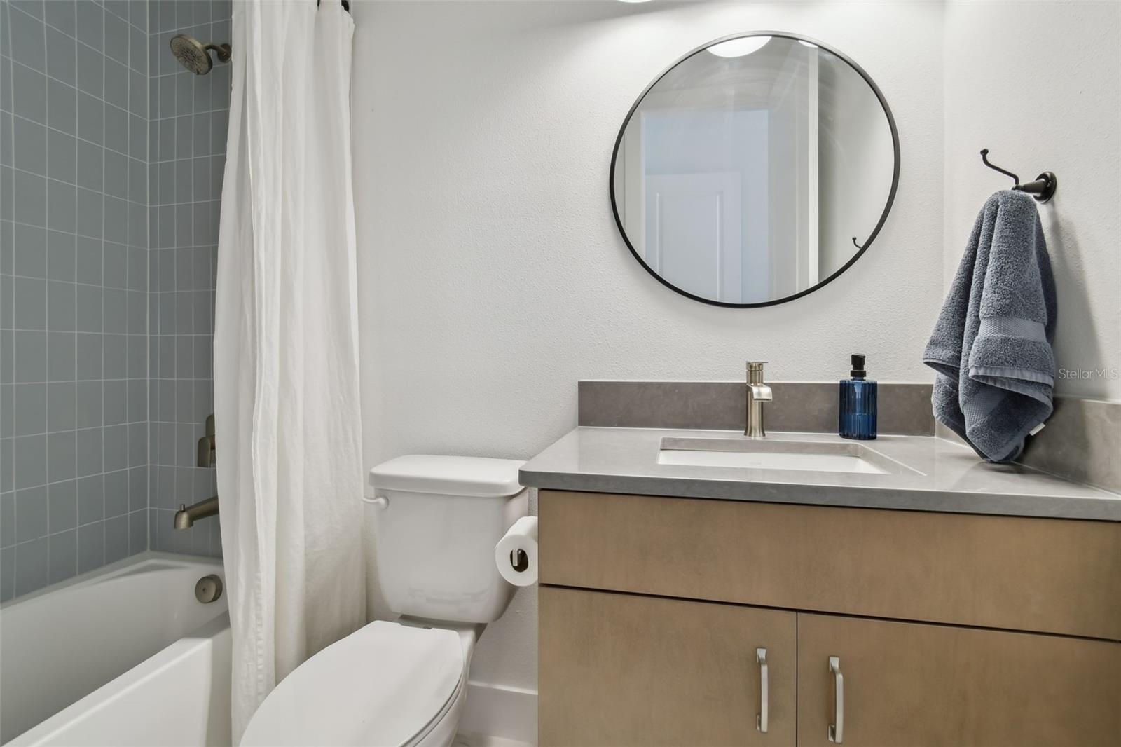 En-Suite Bath with upgraded wood cabinets