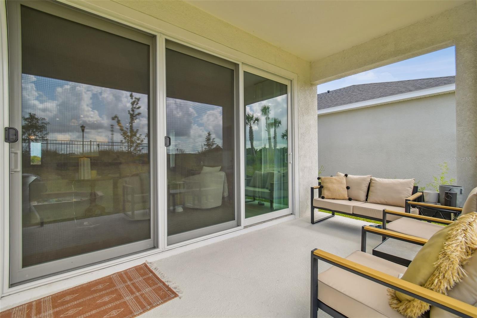 Covered Patio with Upgraded Sliders (Impact Glass)