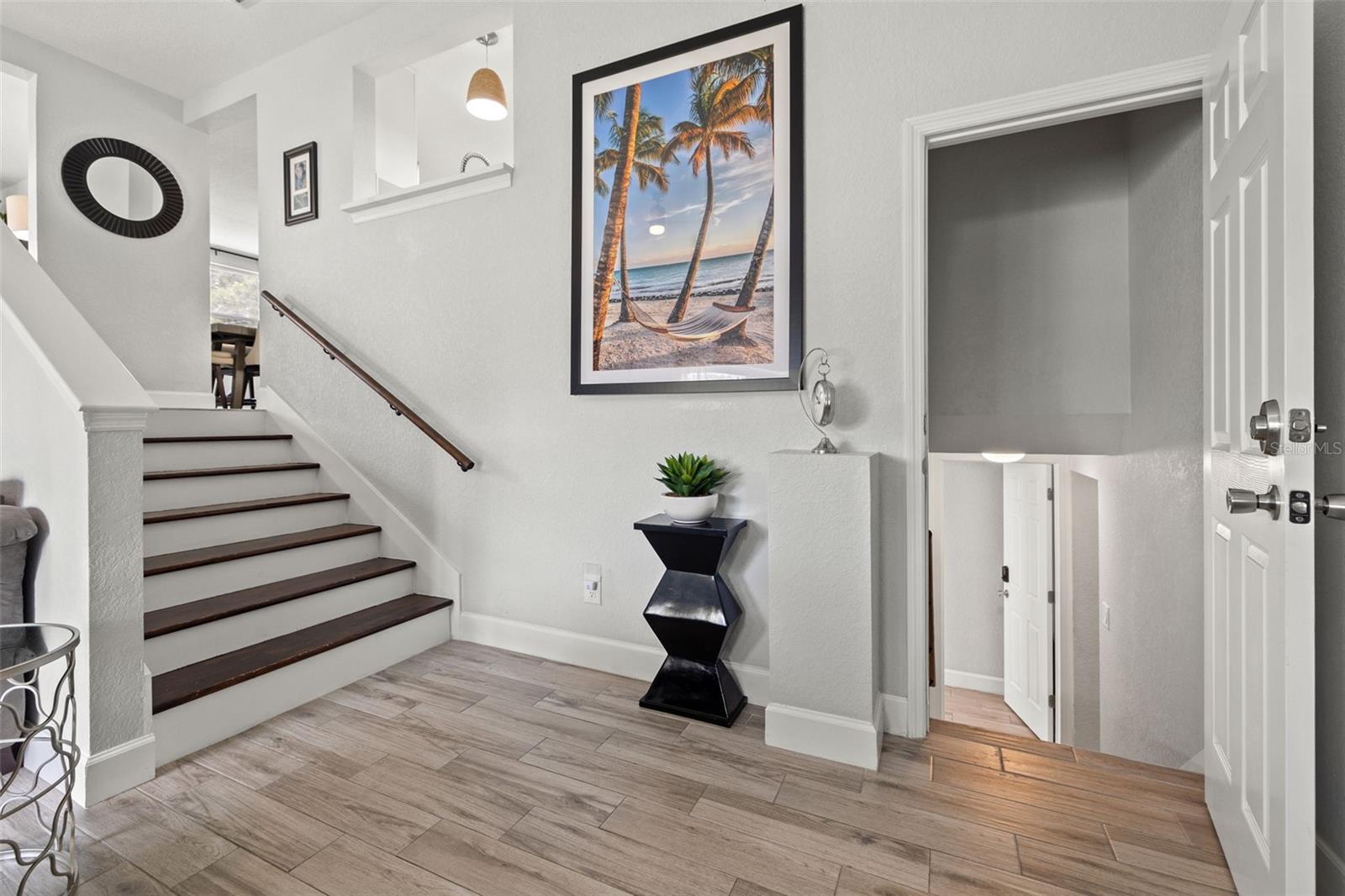 Stairs to Upper Area of Home and Lower Level Access