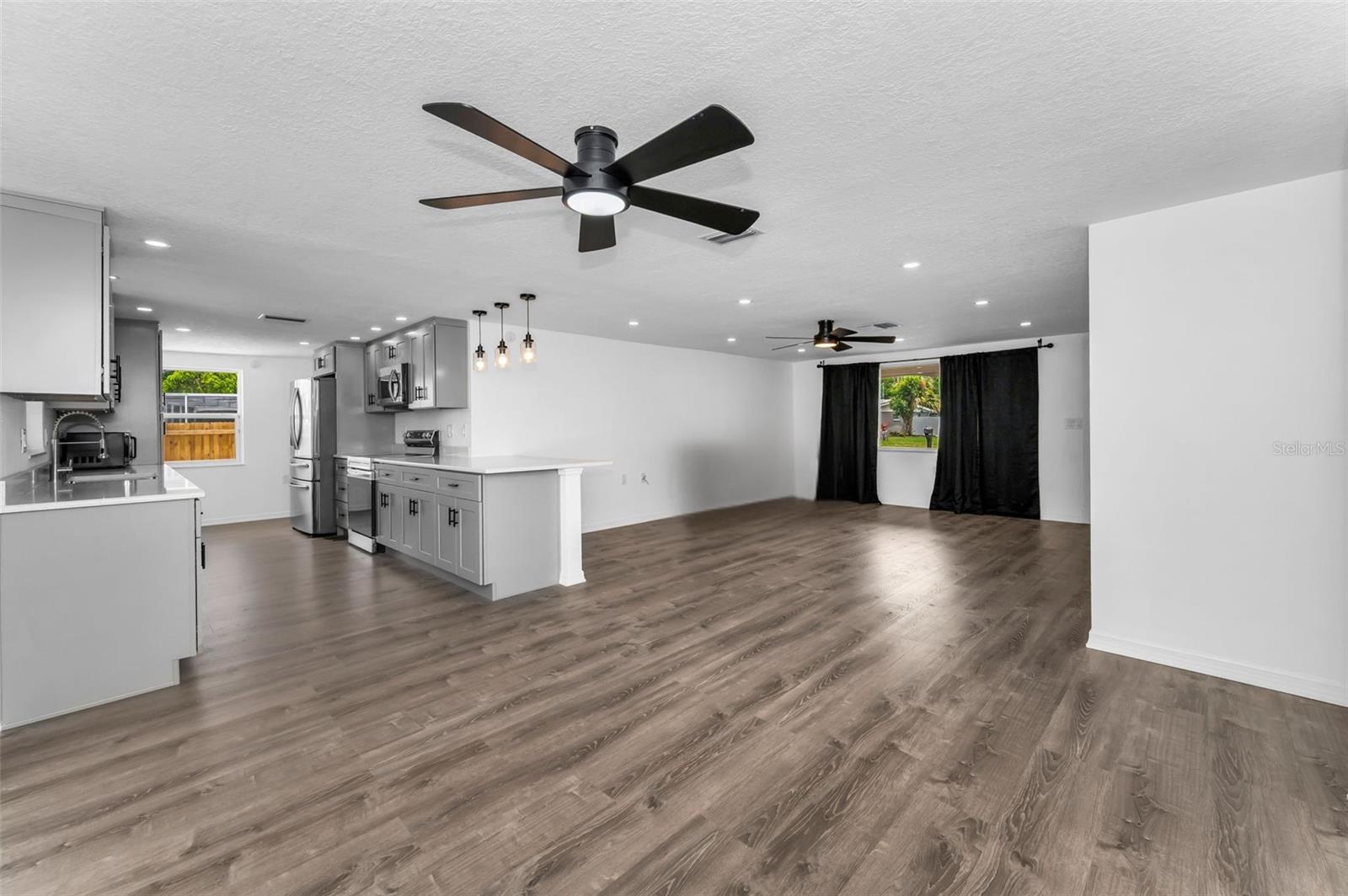 Living Room/Dining Room5022 Forest Hills Dr, Holiday FL