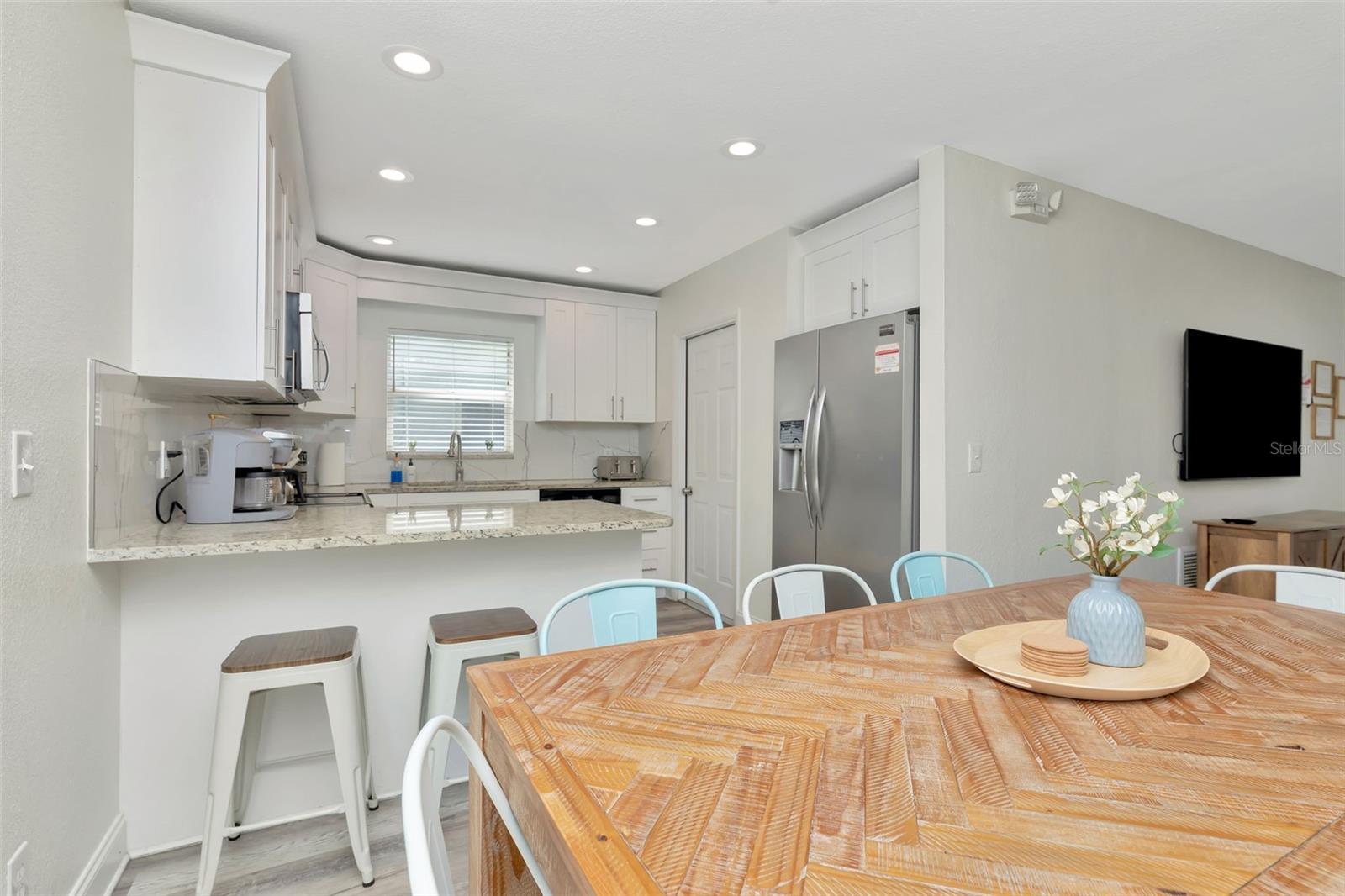 View into the kitchen from dining room.