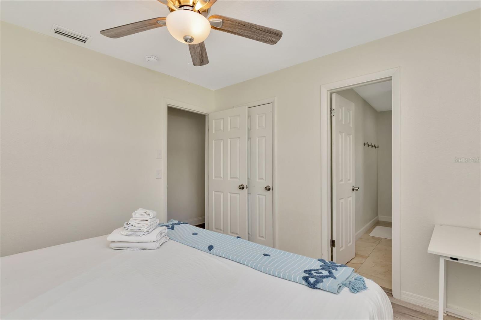 Another view of the primary bedroom with ensuite.
