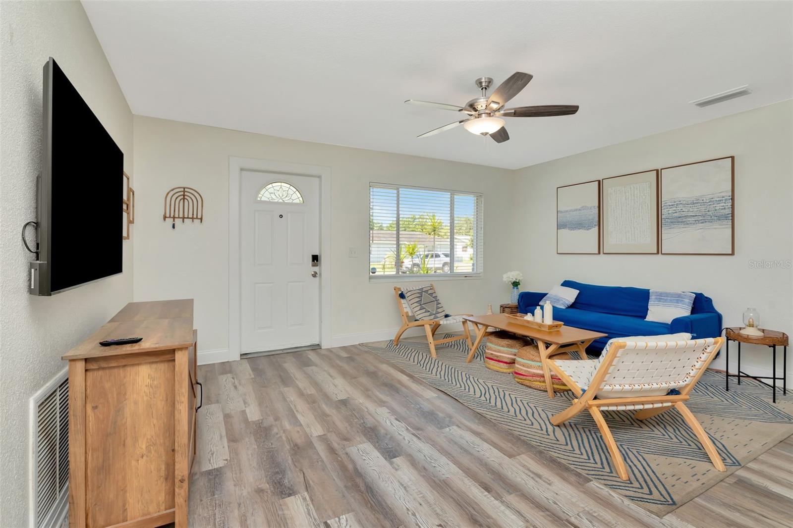 Living room and front entrance to home.