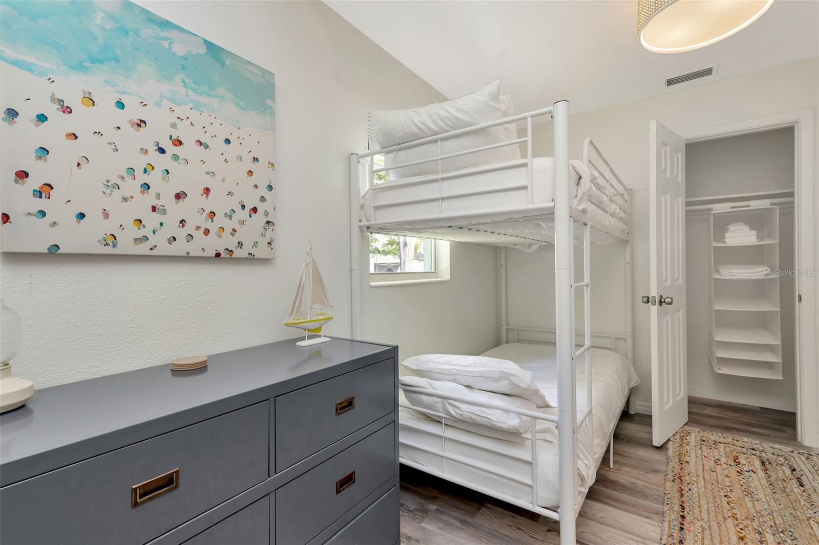 Bedroom 3 and view into closet