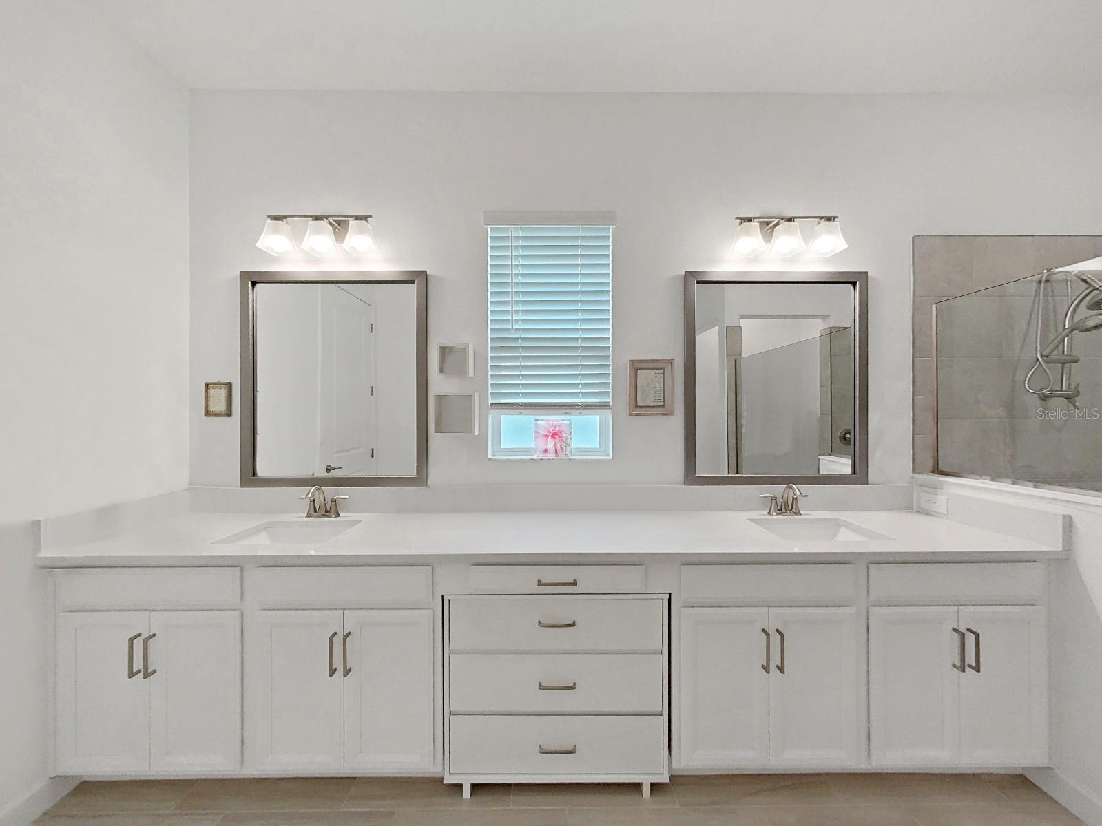 Primary Bathroom with Double Vanity, Walkin Shower.