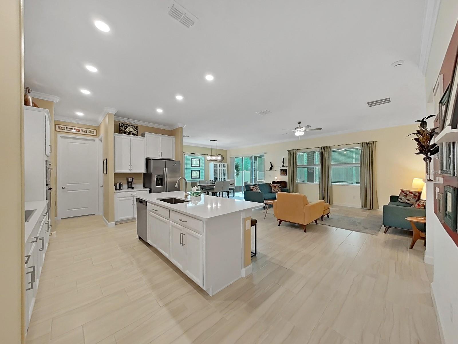 View of Kitchen and Living Room to Patio