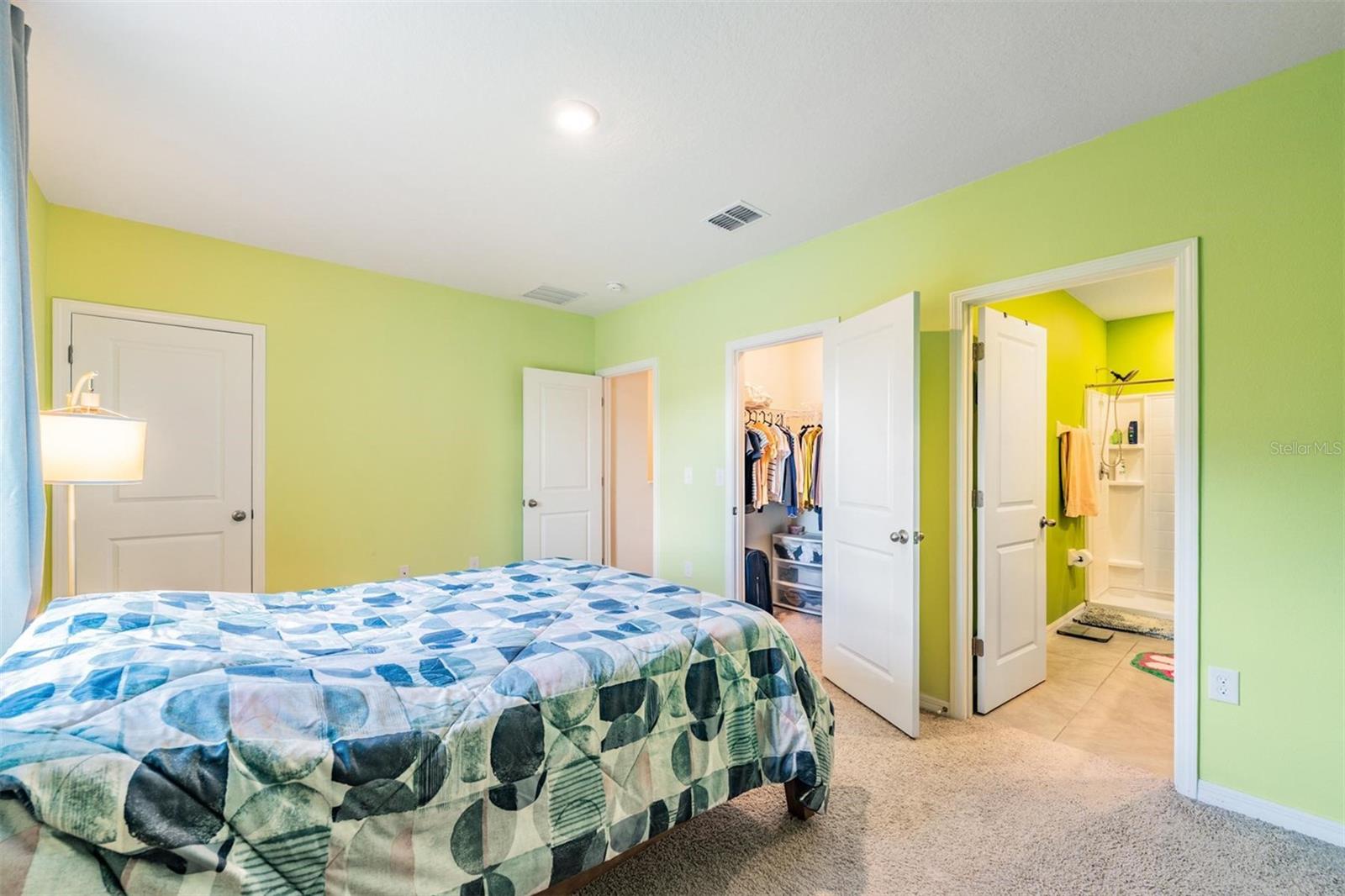 Plenty of storage with two closets in primary bedroom