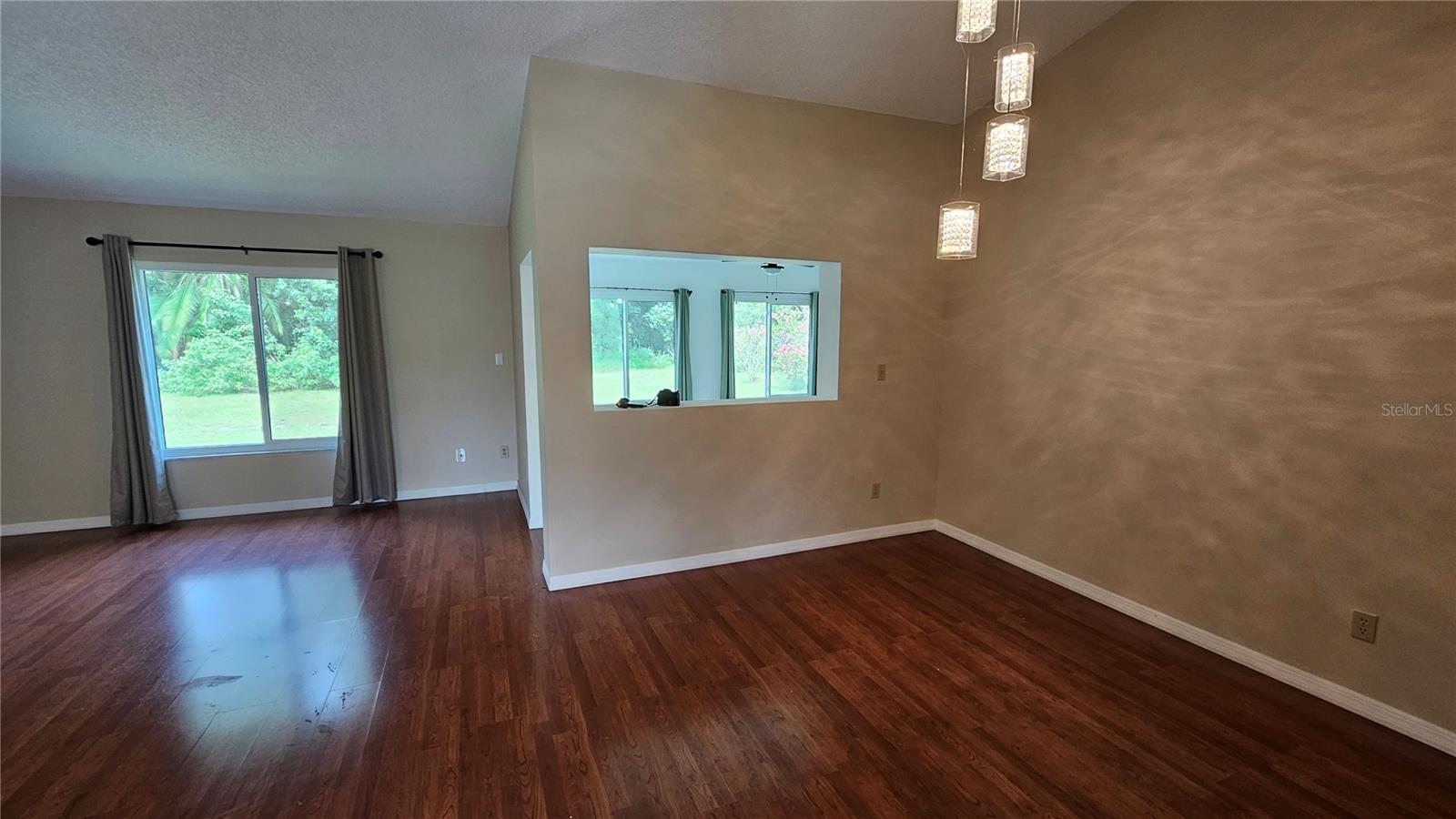 Living room with view toward Florida room