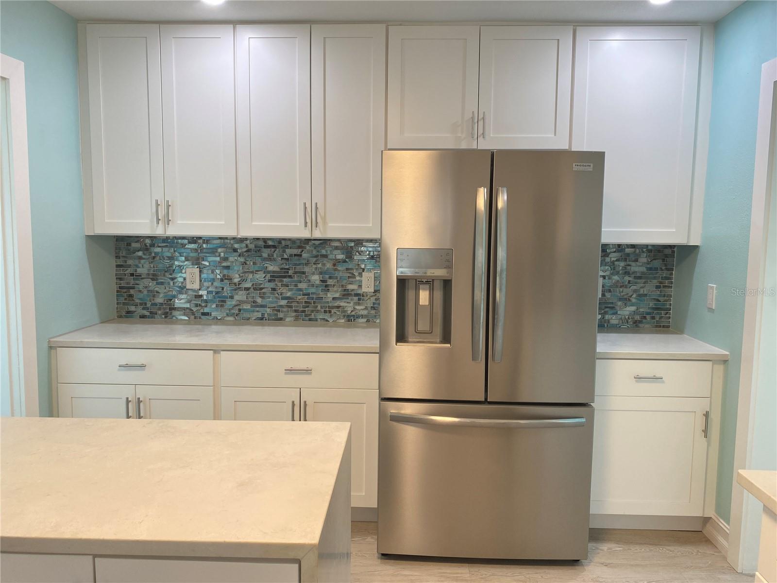 More cabinet space in kitchen with new appliances.