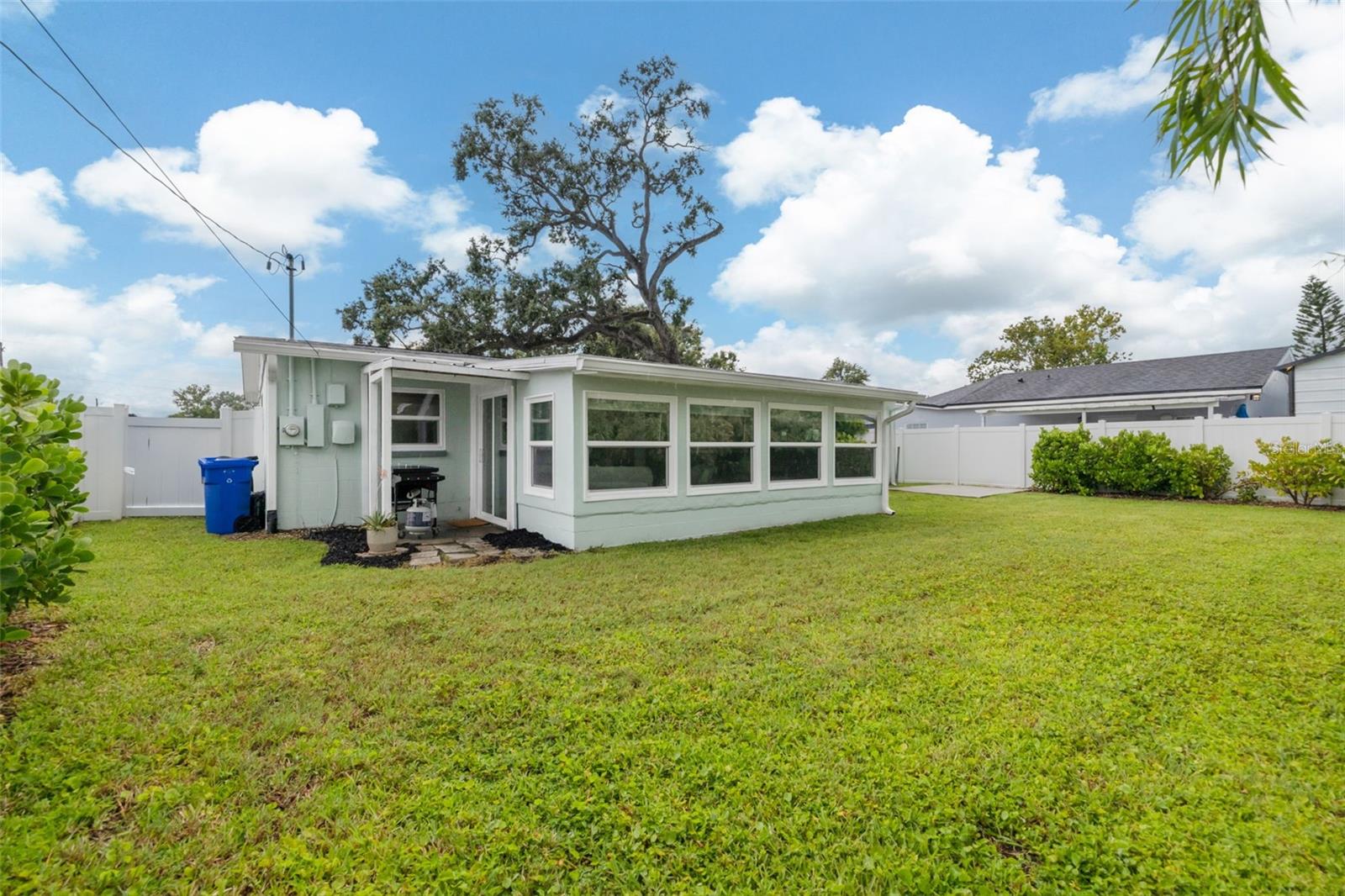 Large Vinyl Fenced yard.